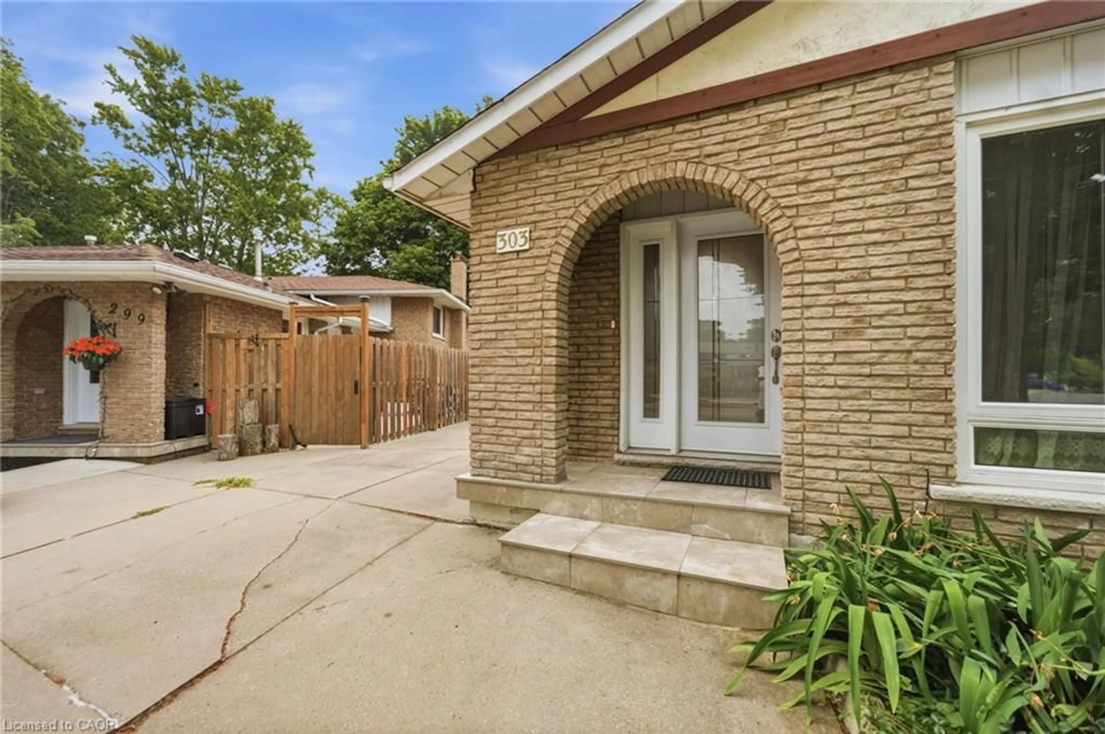 Home with brick exterior material, street for 303 Wendover Dr, Hamilton Ontario L9C 5X5