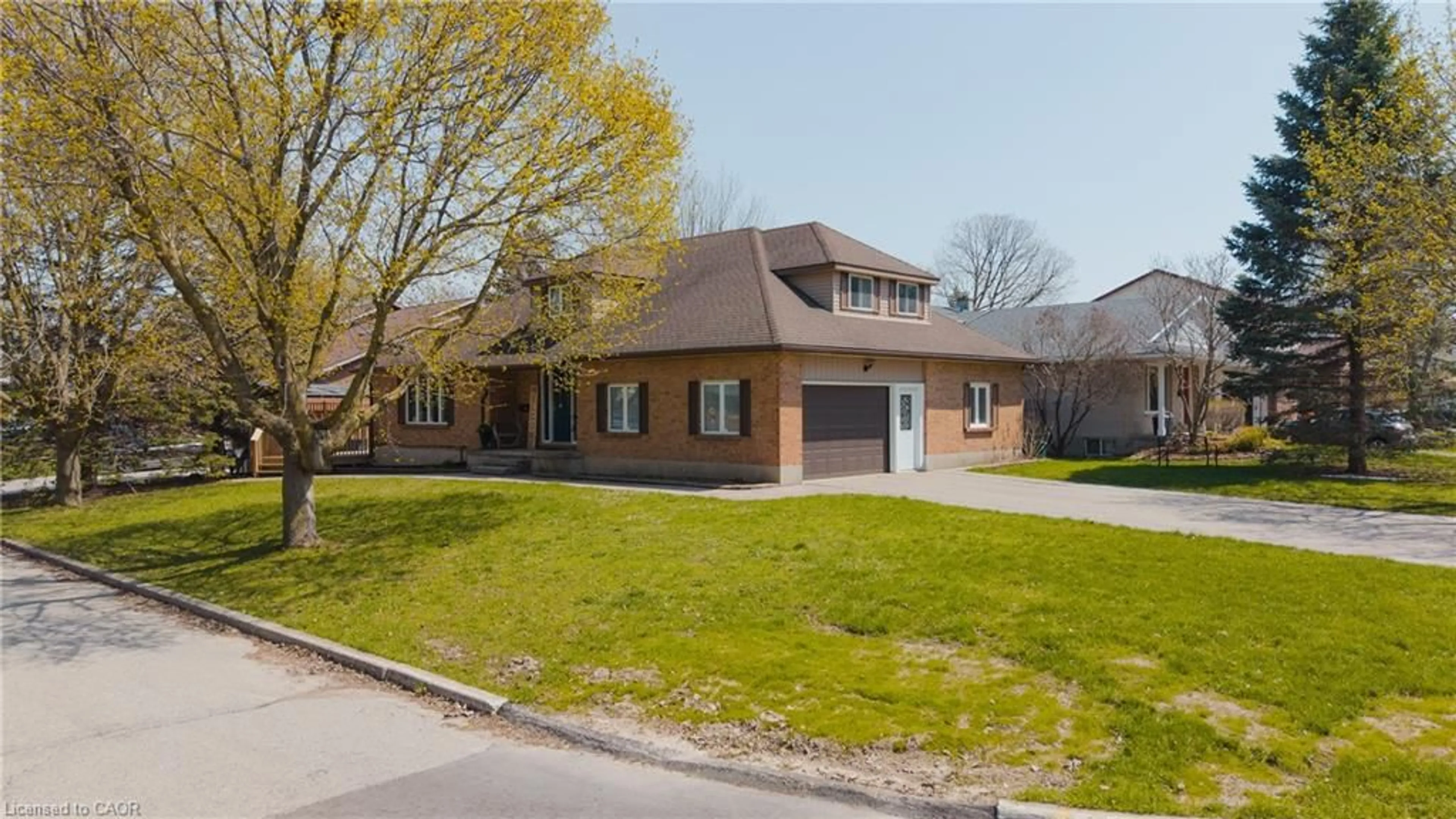 Home with brick exterior material, street for Pl, Waterloo Ontario N2K 3J2