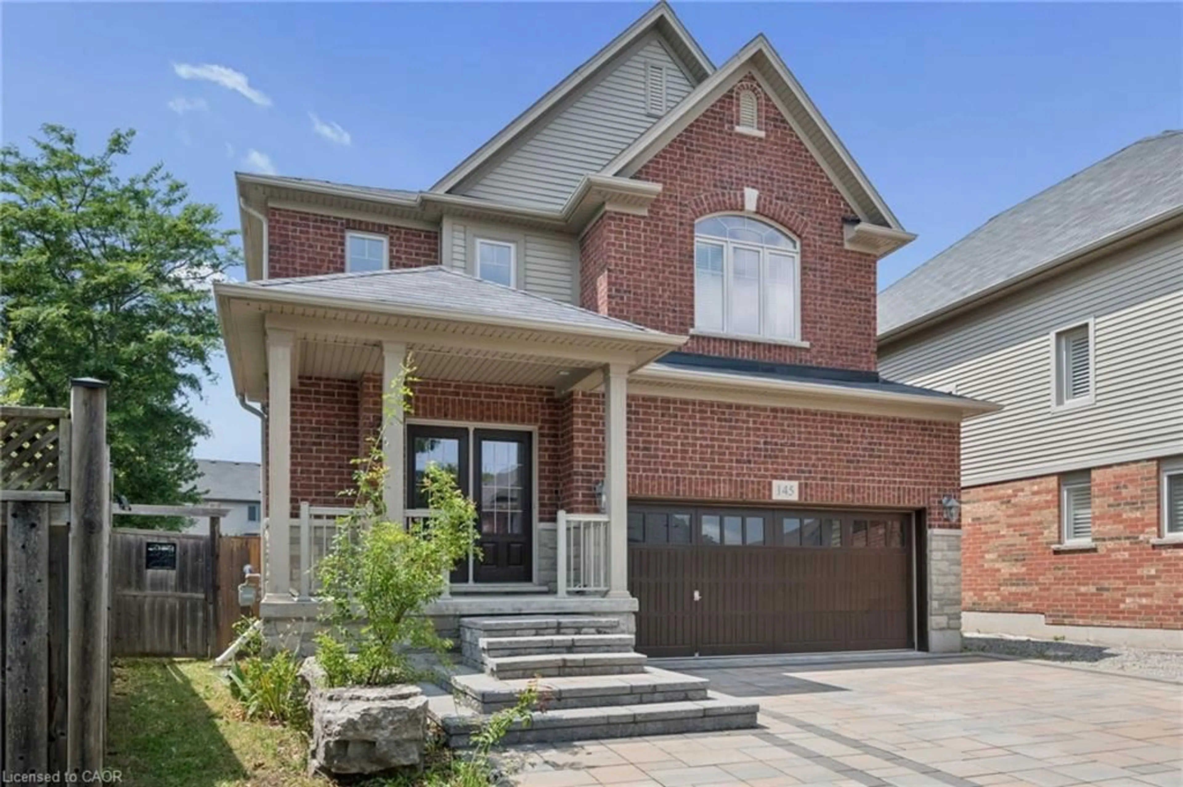 Home with brick exterior material, street for 145 Redtail St, Kitchener Ontario N2K 4J5