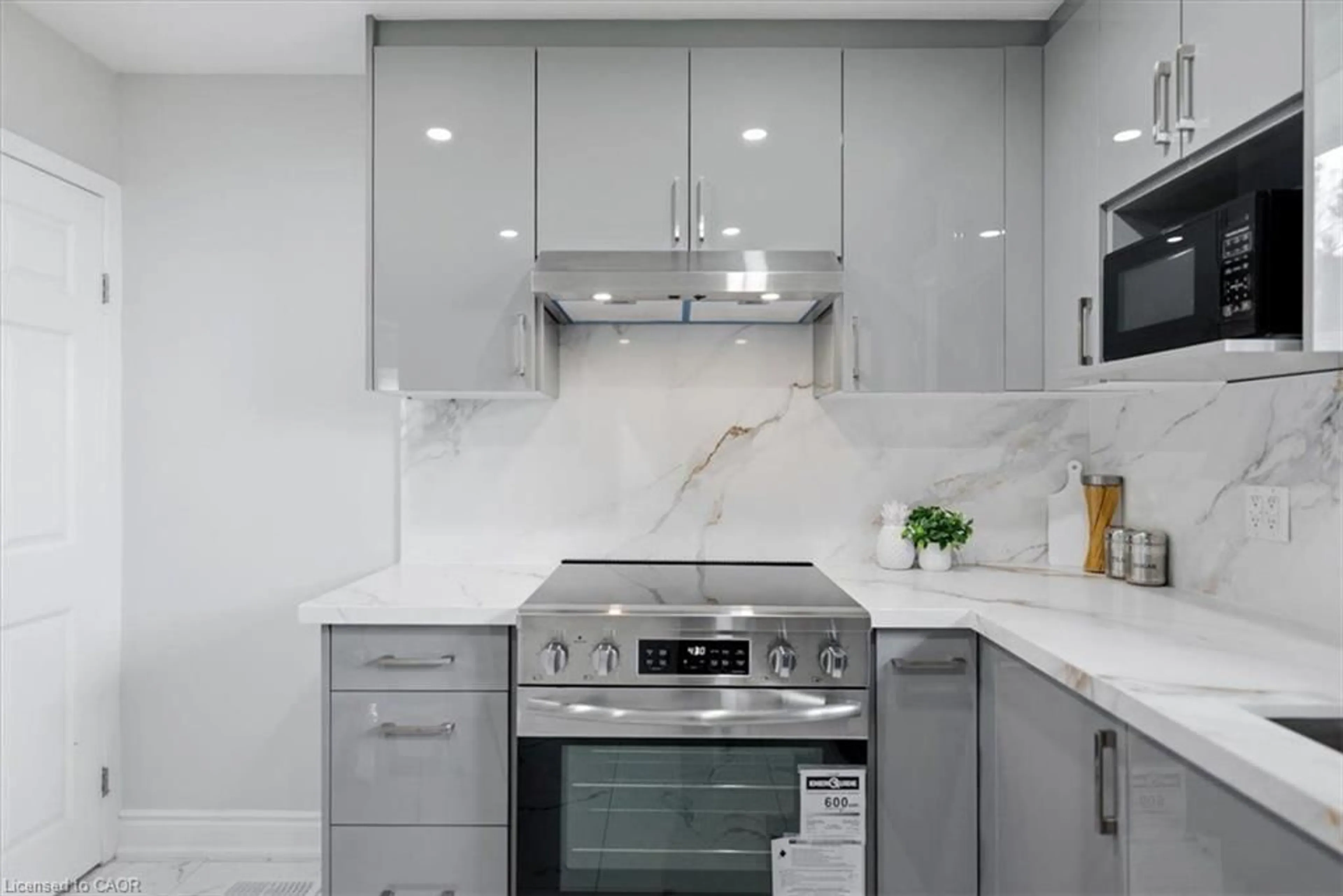 Contemporary kitchen, ceramic/tile floor for Lane, Waterloo Ontario N2L 4Y2