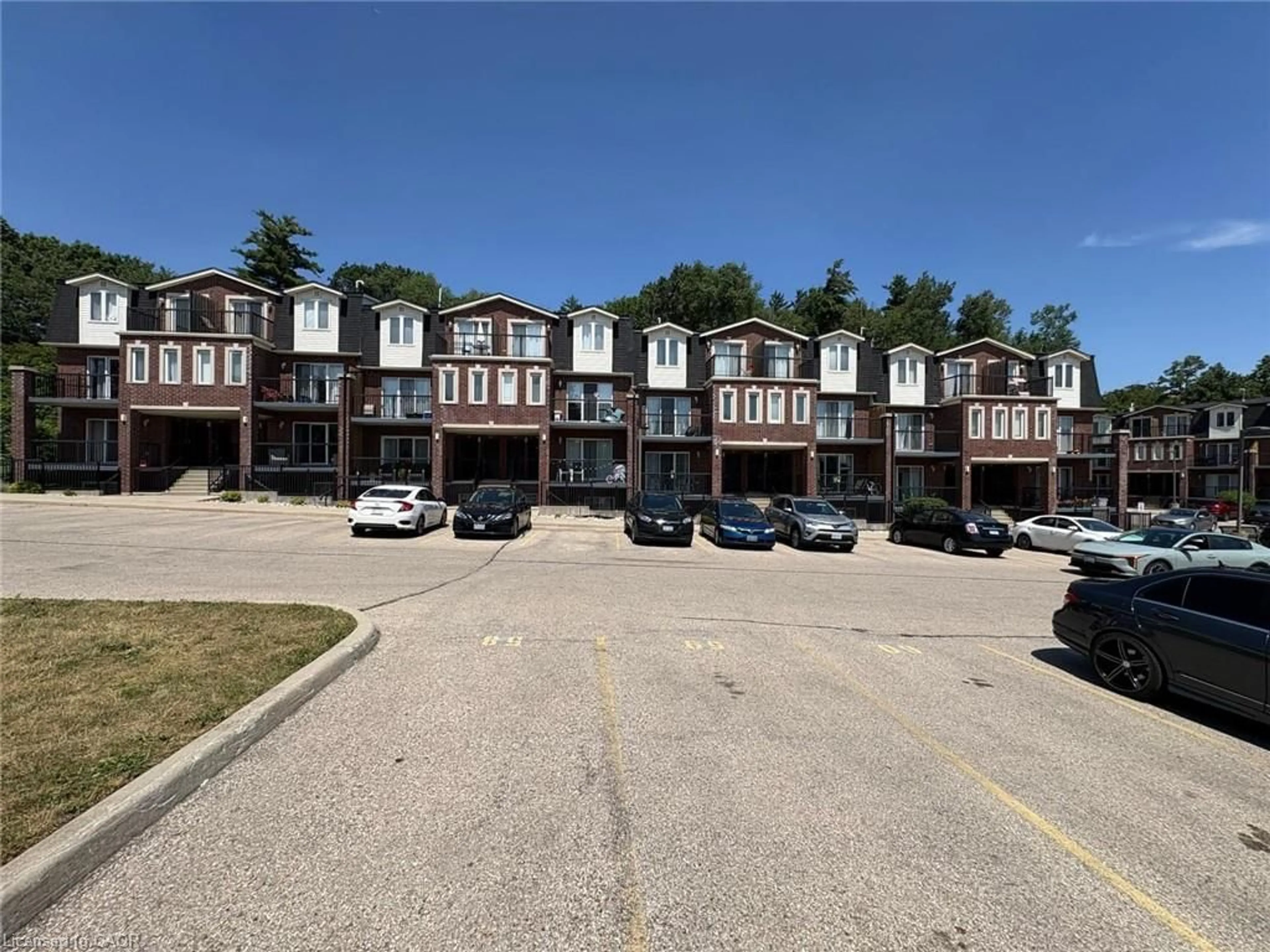 A pic from outside/outdoor area/front of a property/back of a property/a pic from drone, street for 45 Cedarhill Cres #5A, Kitchener Ontario N2E 0A2