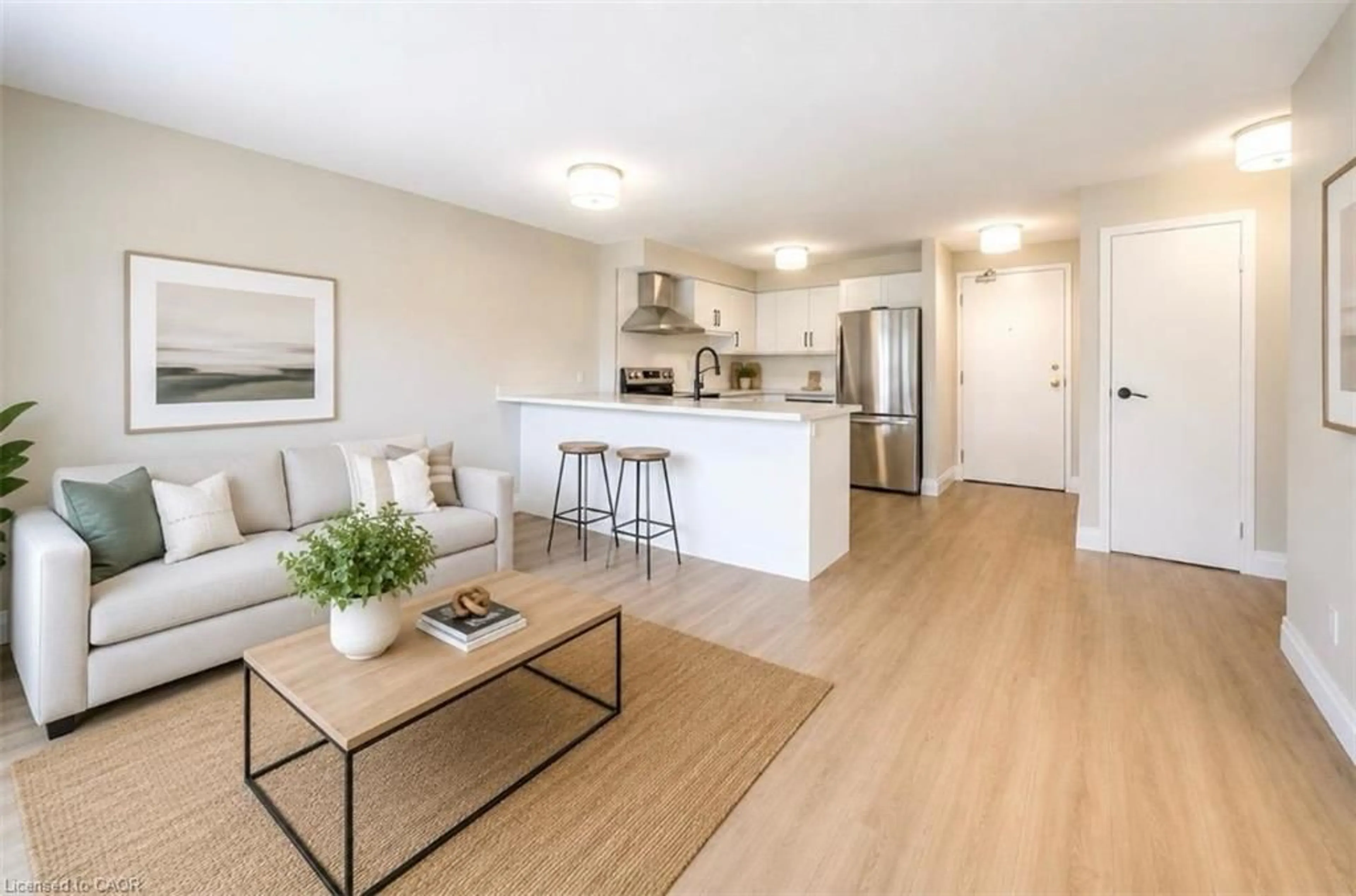 Open concept kitchen, wood/laminate floor for 30 Hugo Cres #107, Kitchener Ontario N2M 3Z2