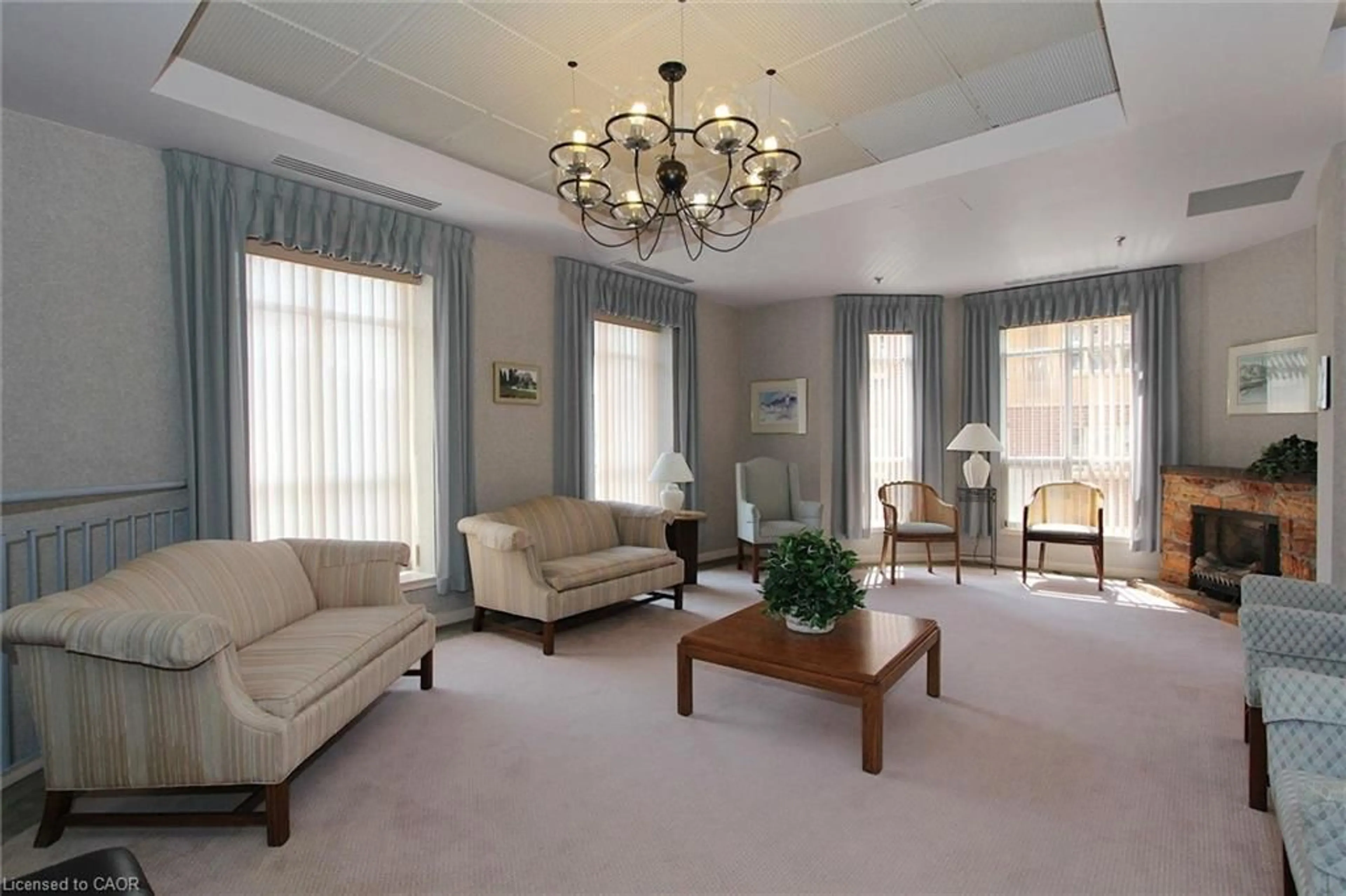 Living room with furniture, carpet floor for 1414 King St #808, Kitchener Ontario N2G 4T8