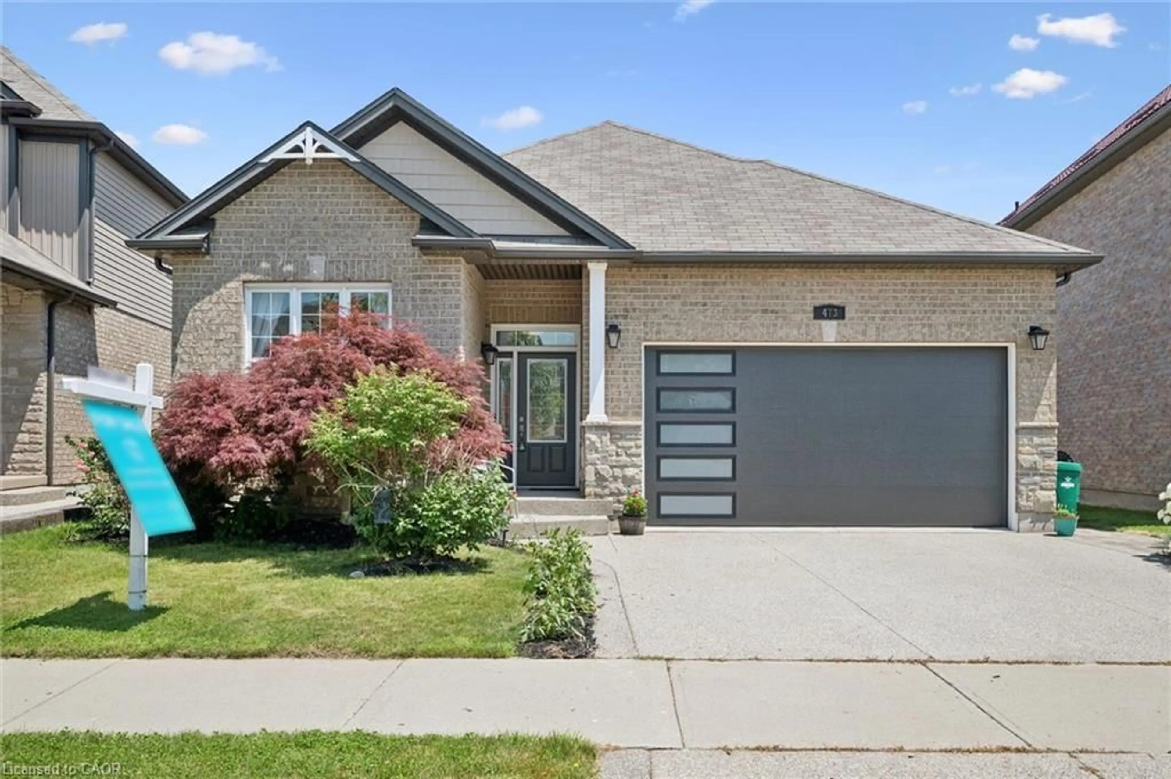 Home with brick exterior material, street for 473 Woodbine Ave, Kitchener Ontario N2R 0A6