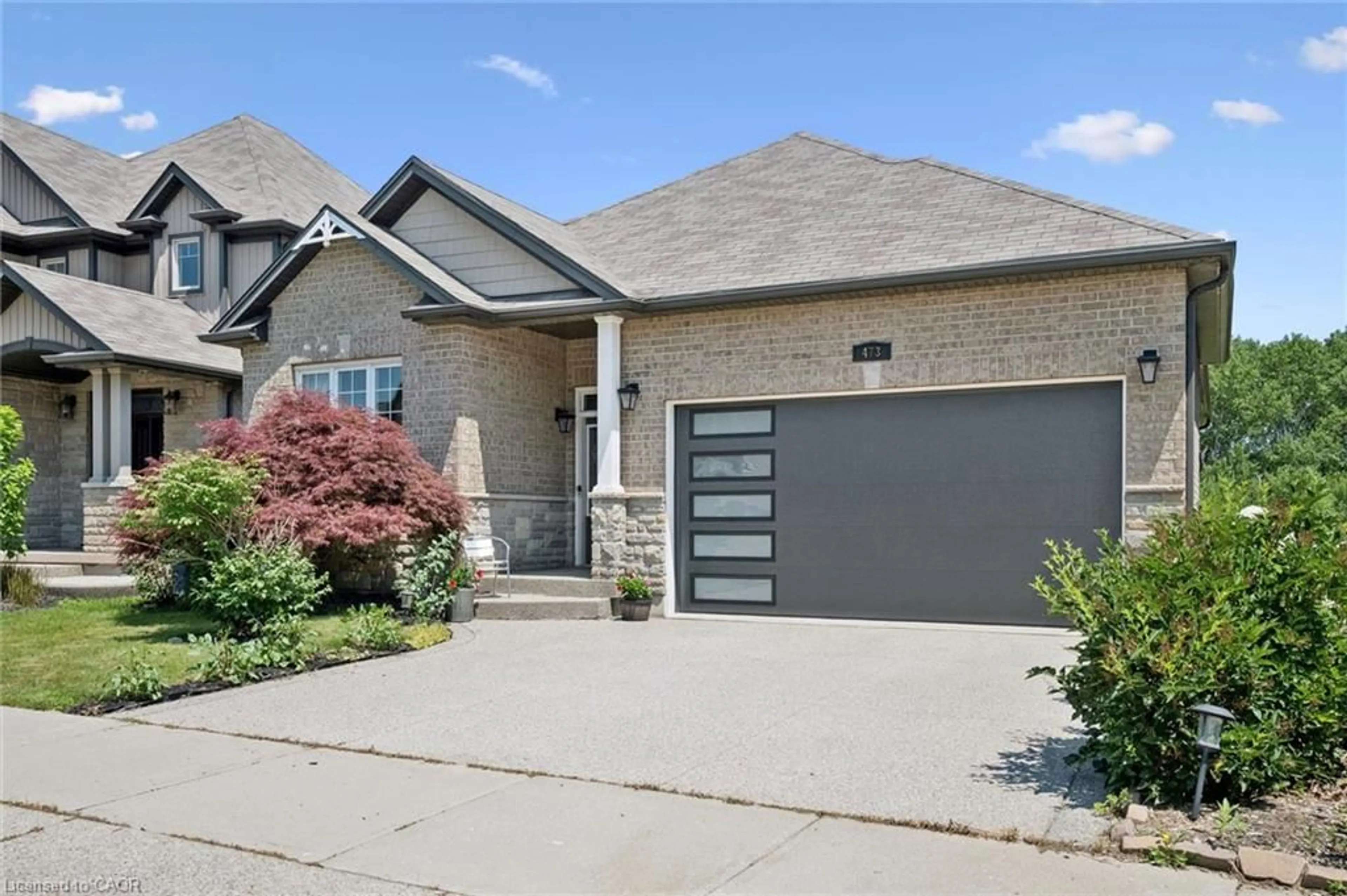 Home with brick exterior material, street for 473 Woodbine Ave, Kitchener Ontario N2R 0A6