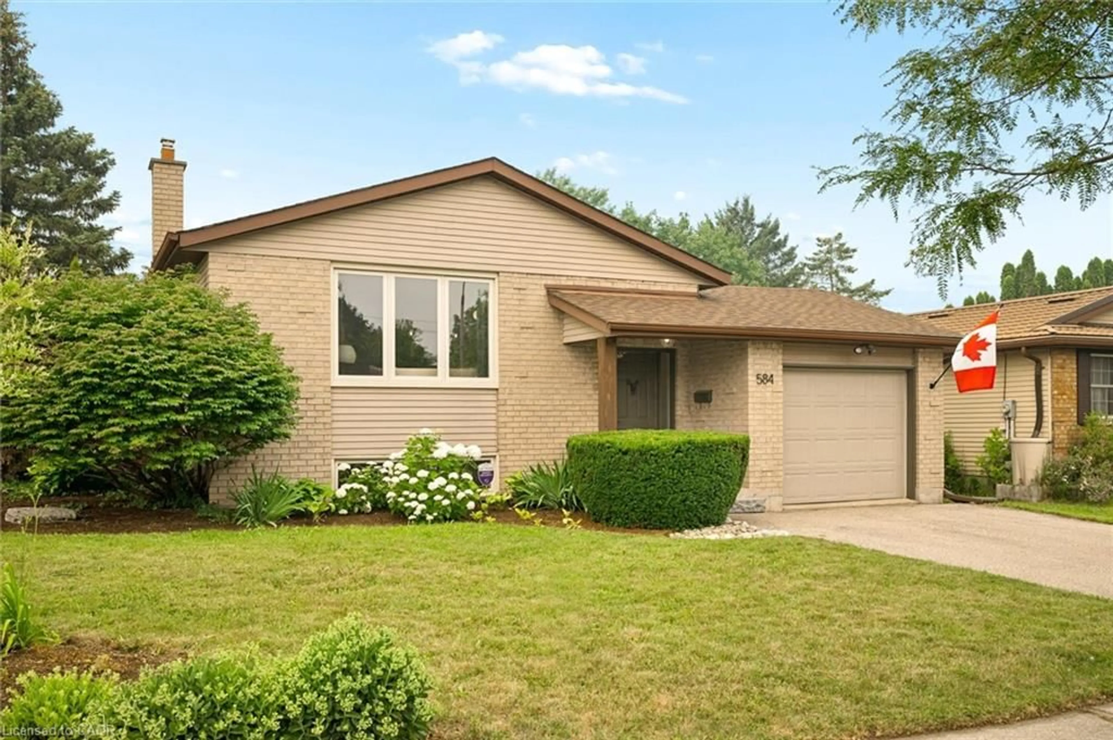 Home with brick exterior material, street for 584 Westvale Dr, Waterloo Ontario N2T 1K2