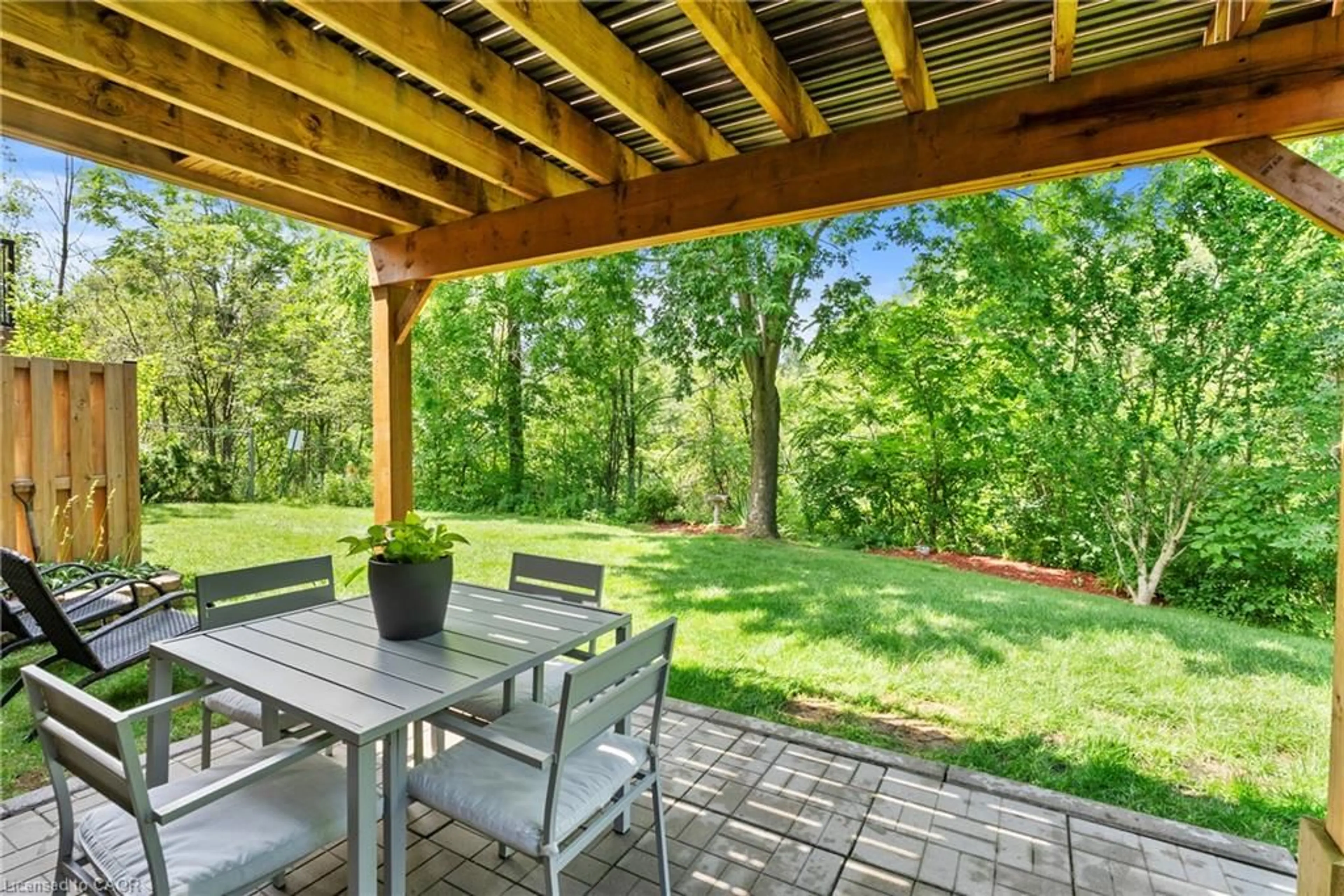 Patio, forest/trees view for 53 Bunting Rd #15, St. Catharines Ontario L2P 3Y6