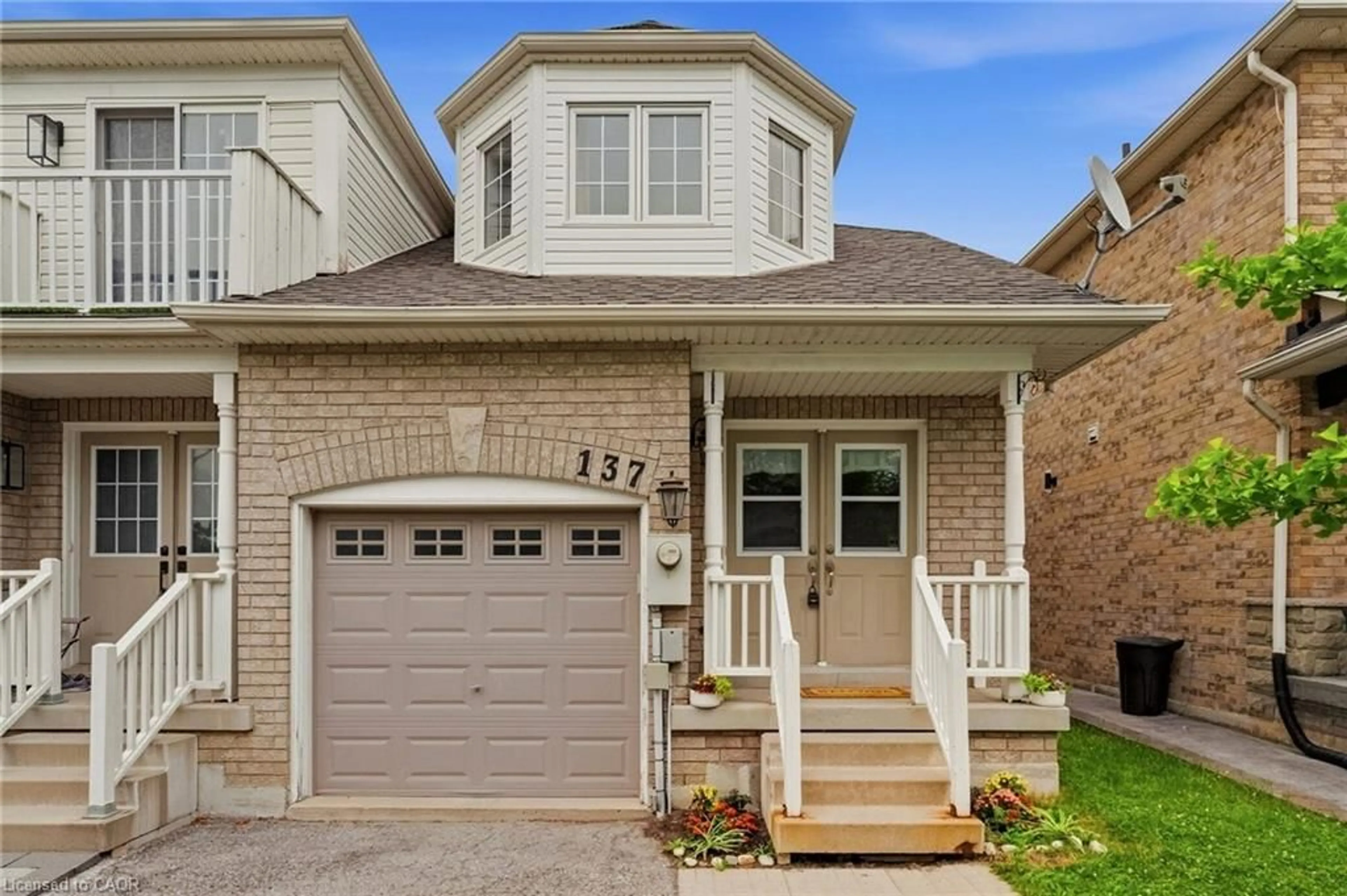Home with brick exterior material, street for 137 Dominion Gardens Dr, Georgetown Ontario L7G 6B6