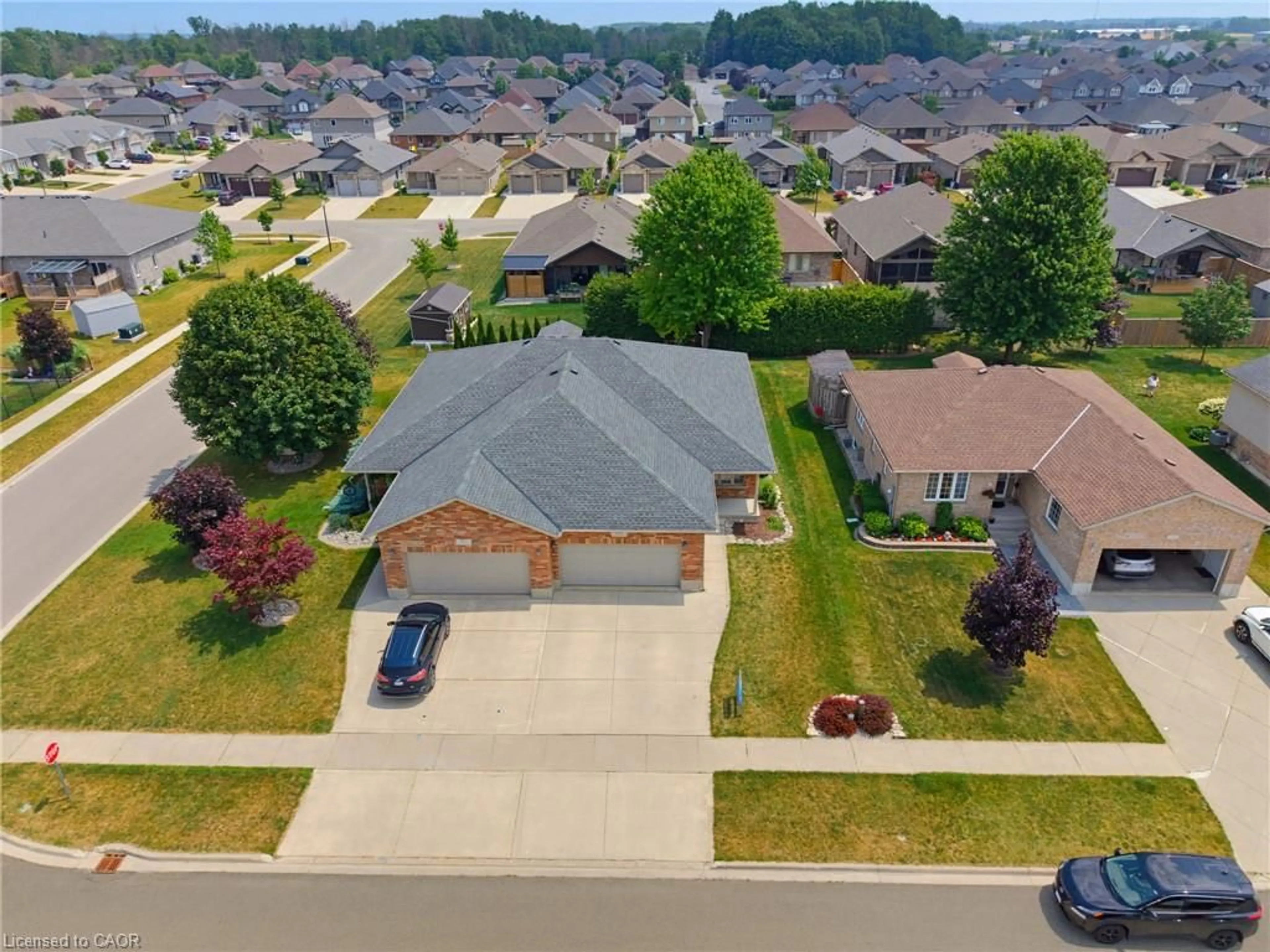 A pic from outside/outdoor area/front of a property/back of a property/a pic from drone, street for 906 Baker Ave, Listowel Ontario N4W 3V7