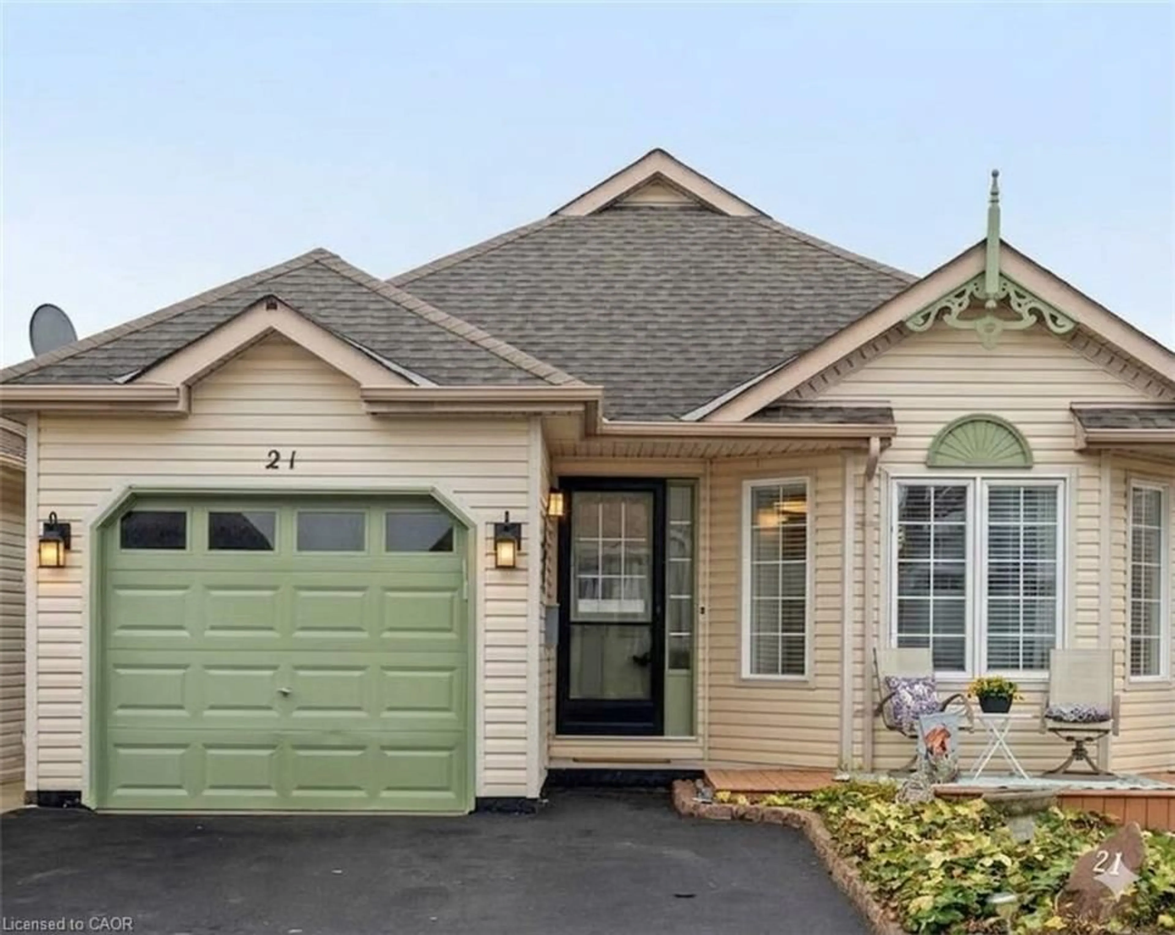 Home with vinyl exterior material, street for 21 Long Point Blvd, Port Rowan Ontario N0E 1M0
