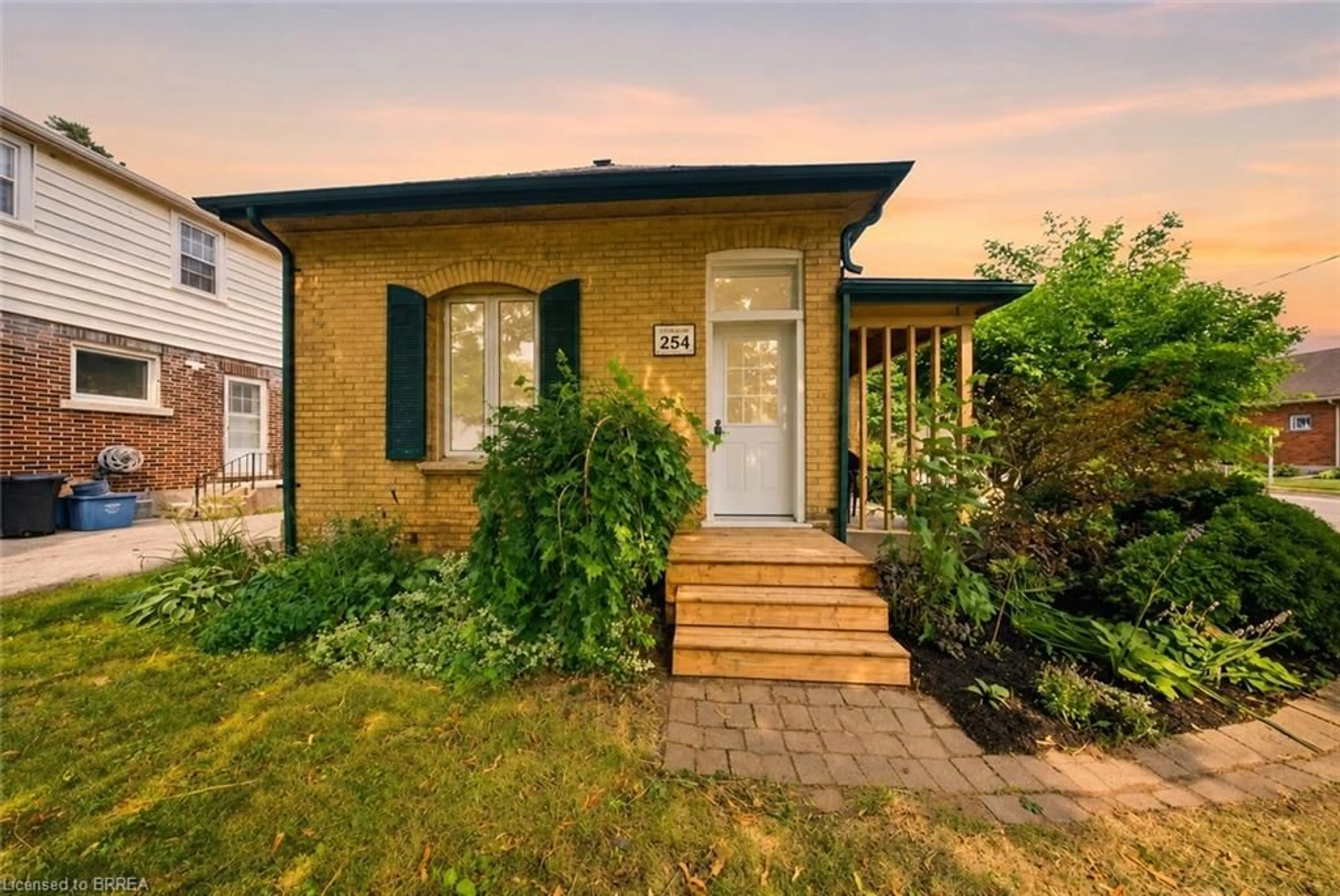 Home with brick exterior material, street for 254 Erie Ave, Brantford Ontario N3S 2H2