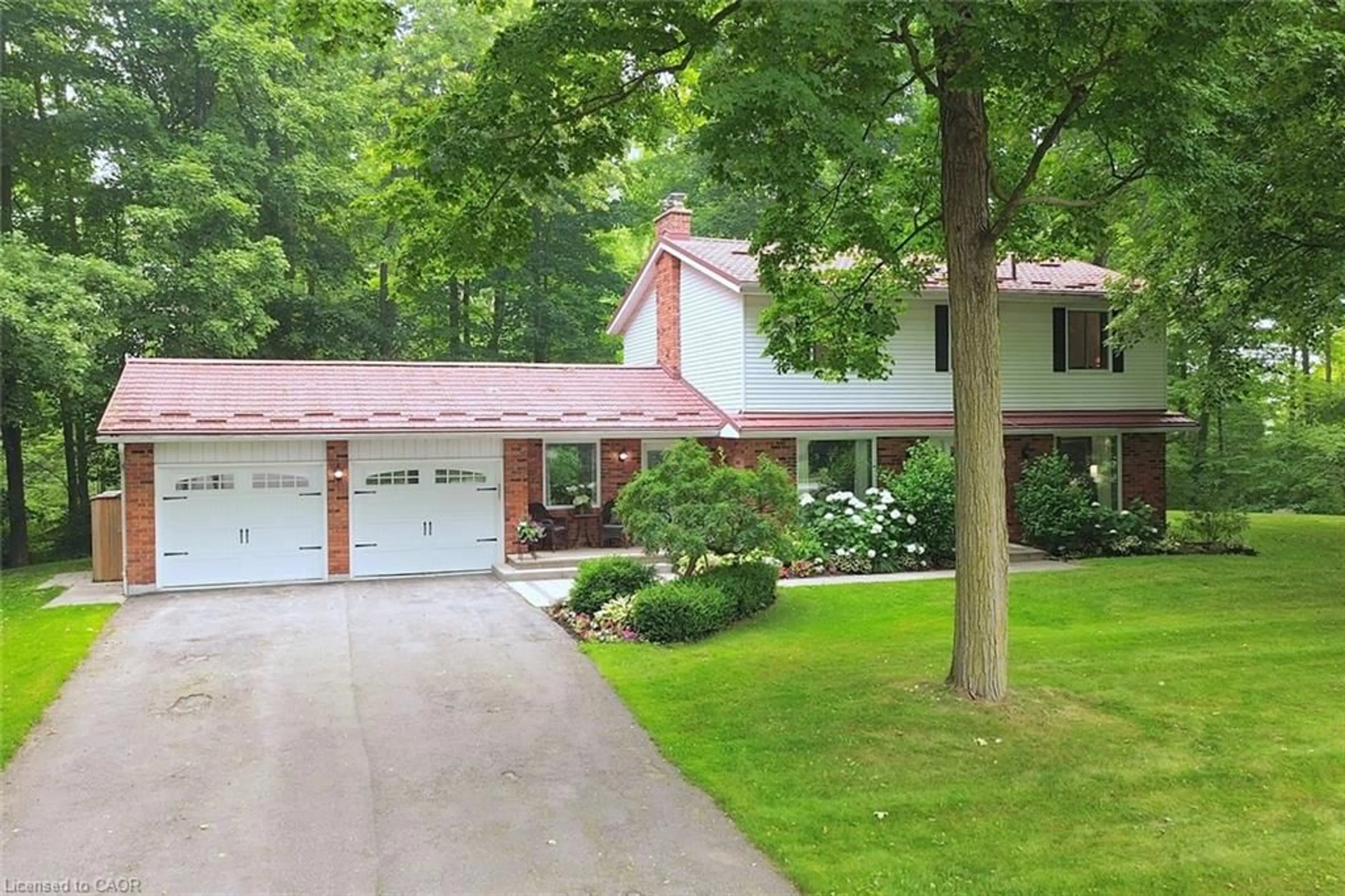 Home with vinyl exterior material, street for Rd, Carlisle Ontario L0P 1B0
