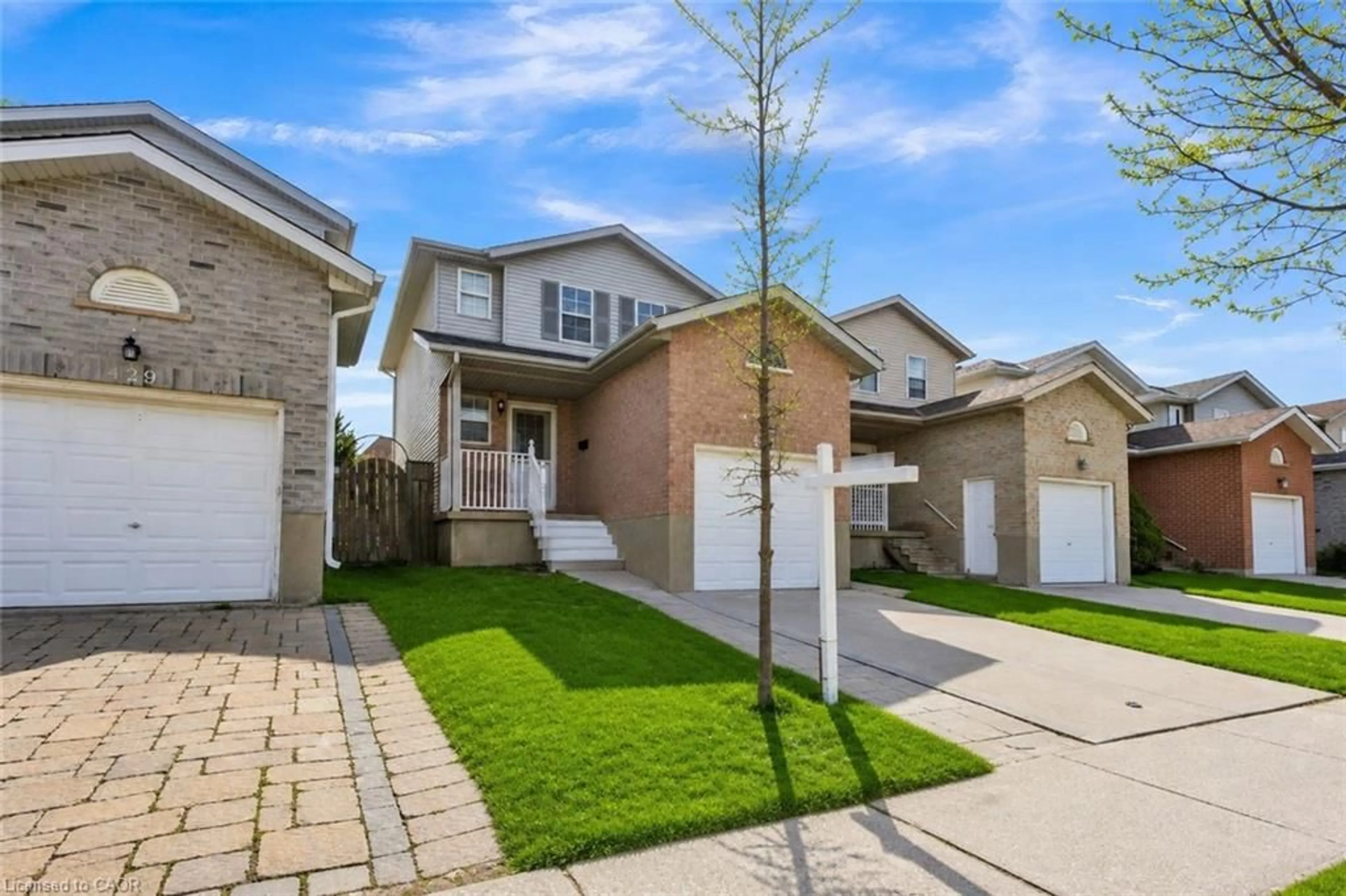 Home with brick exterior material, street for 425 Erinbrook Dr, Kitchener Ontario N2E 3S4