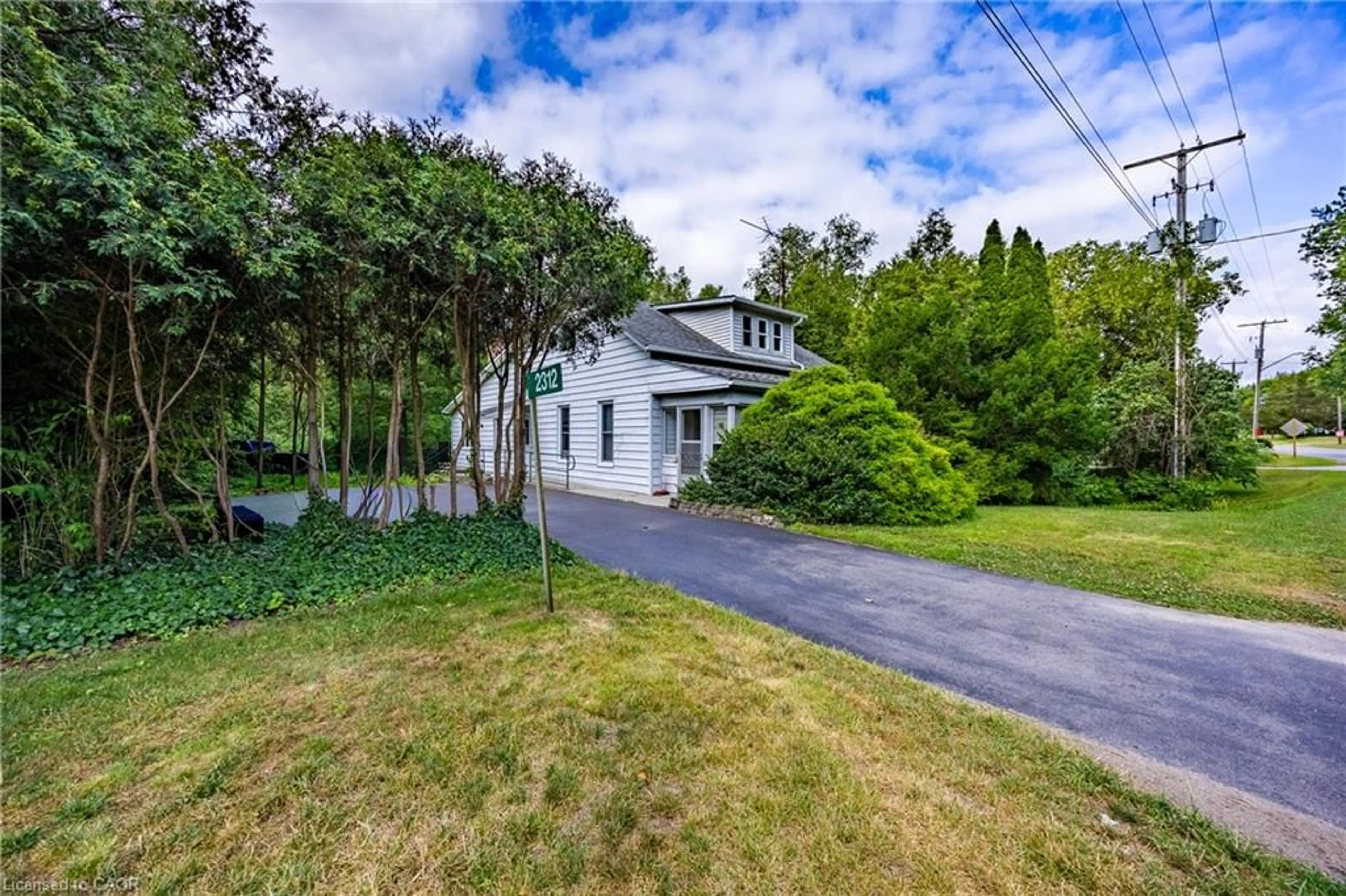 A pic from outside/outdoor area/front of a property/back of a property/a pic from drone, street for 2312 Front Rd, Normandale Ontario N0E 1W0