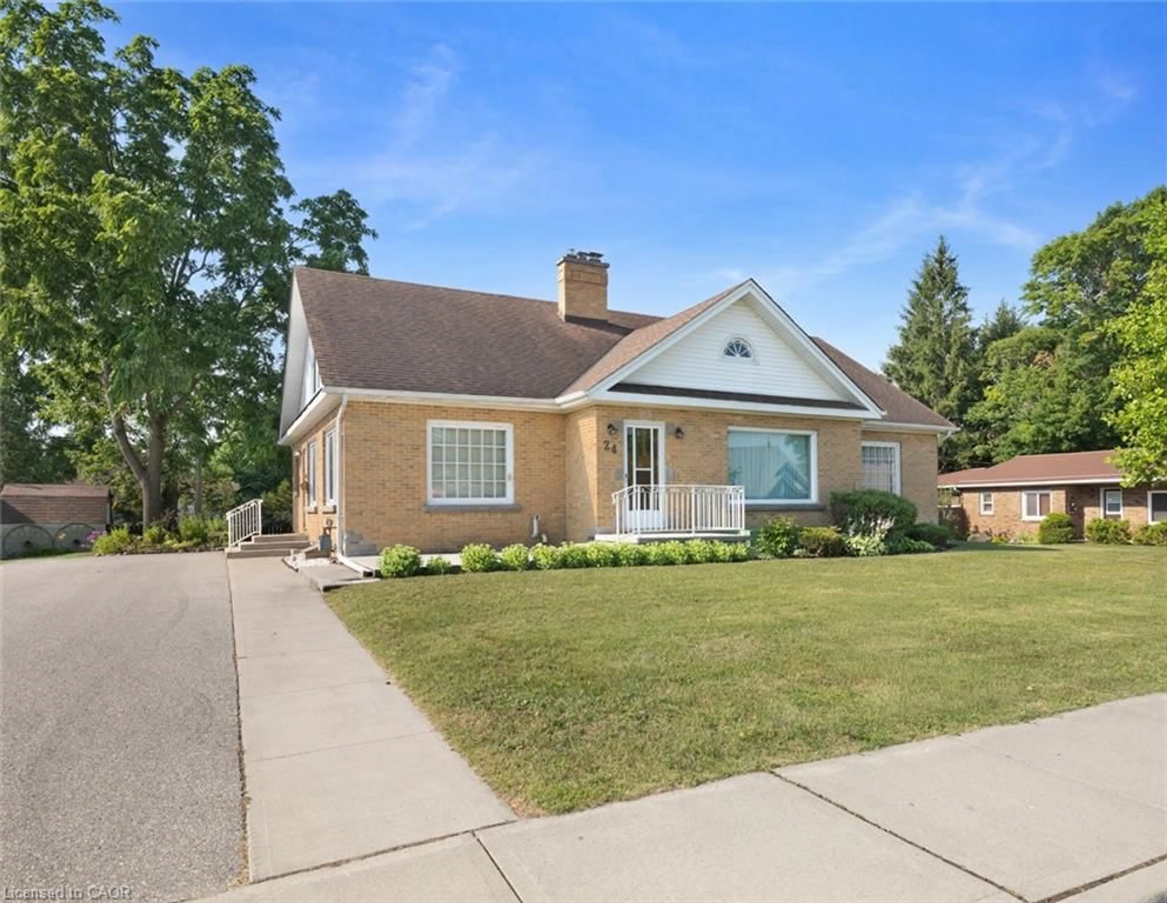 Home with brick exterior material, street for 24 Pine St, Delhi Ontario N4B 1N6