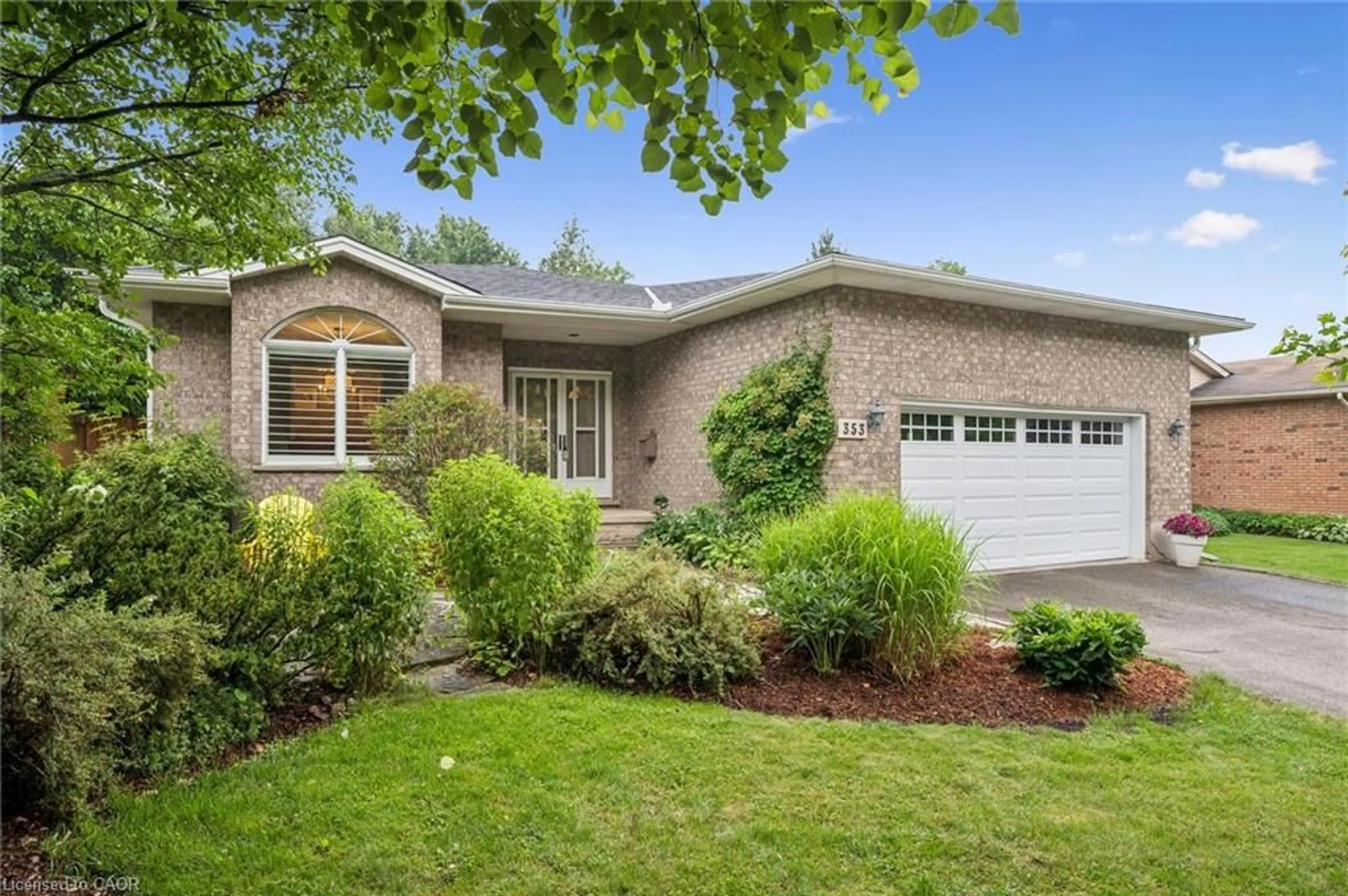 Home with brick exterior material, street for 353 Twinflower Cres, Waterloo Ontario N2V 1X2