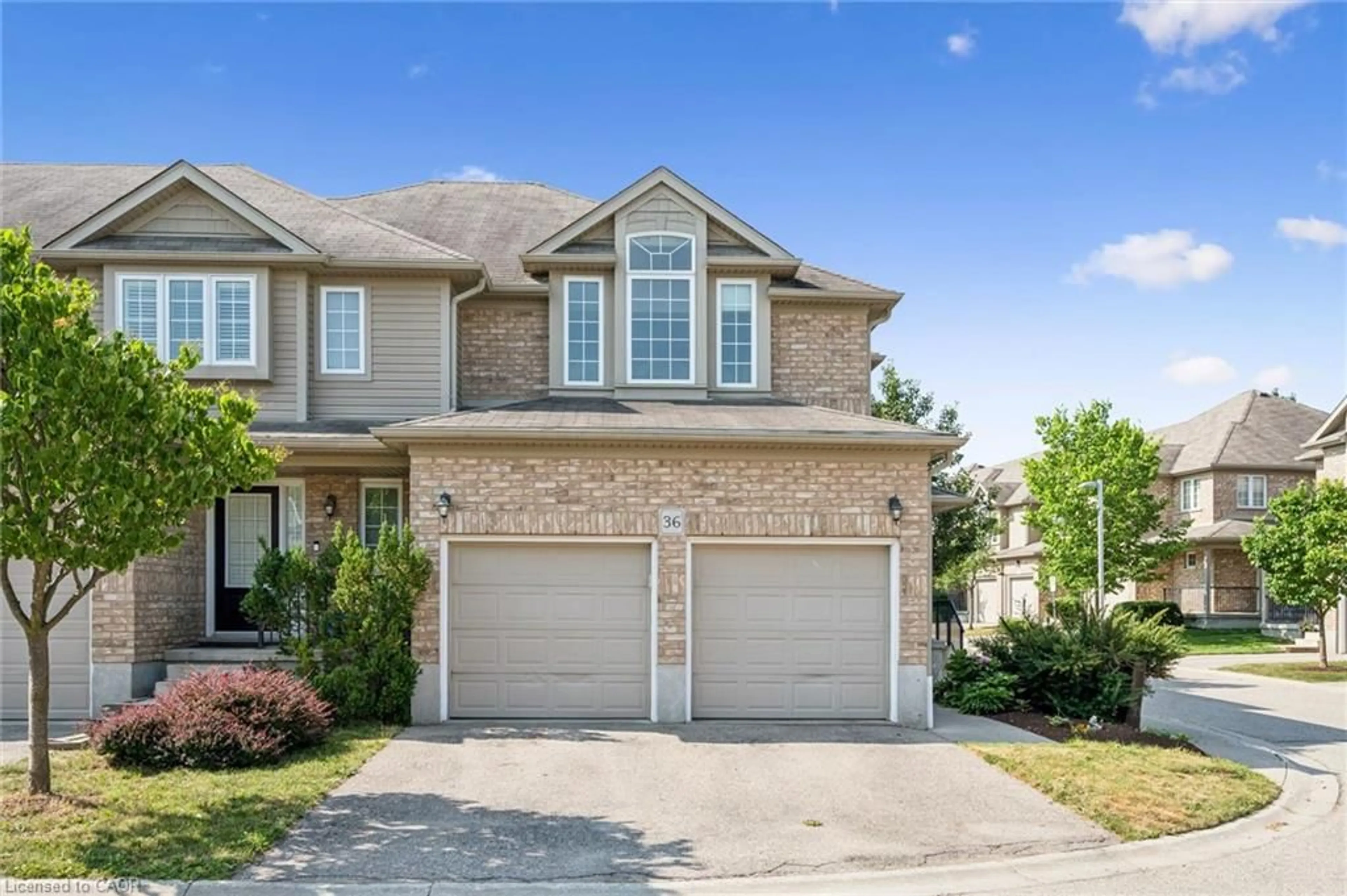 Home with brick exterior material, street for 555 Chablis Dr #36, Waterloo Ontario N2T 2Y7