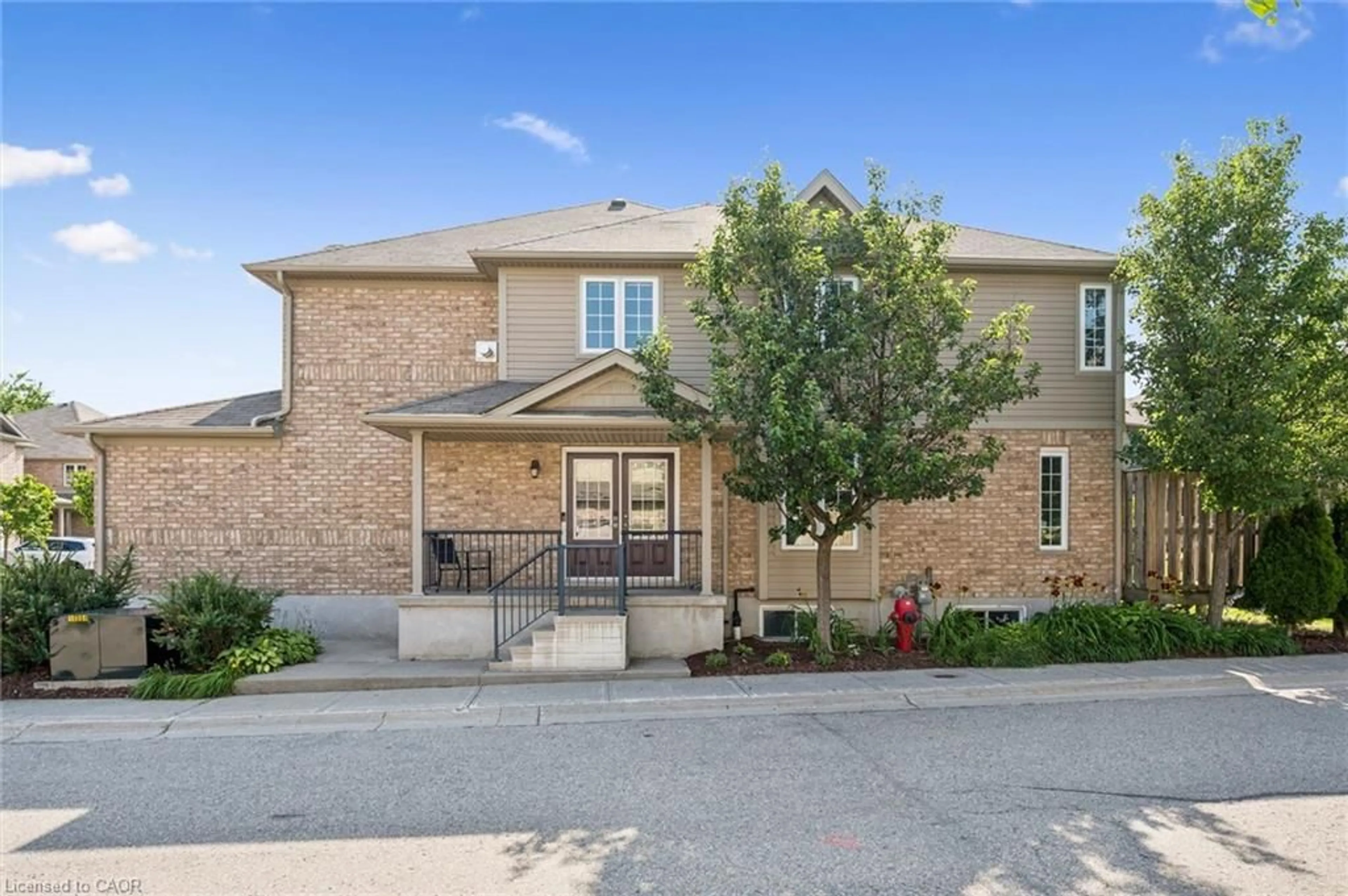 Home with brick exterior material, street for 555 Chablis Dr #36, Waterloo Ontario N2T 2Y7