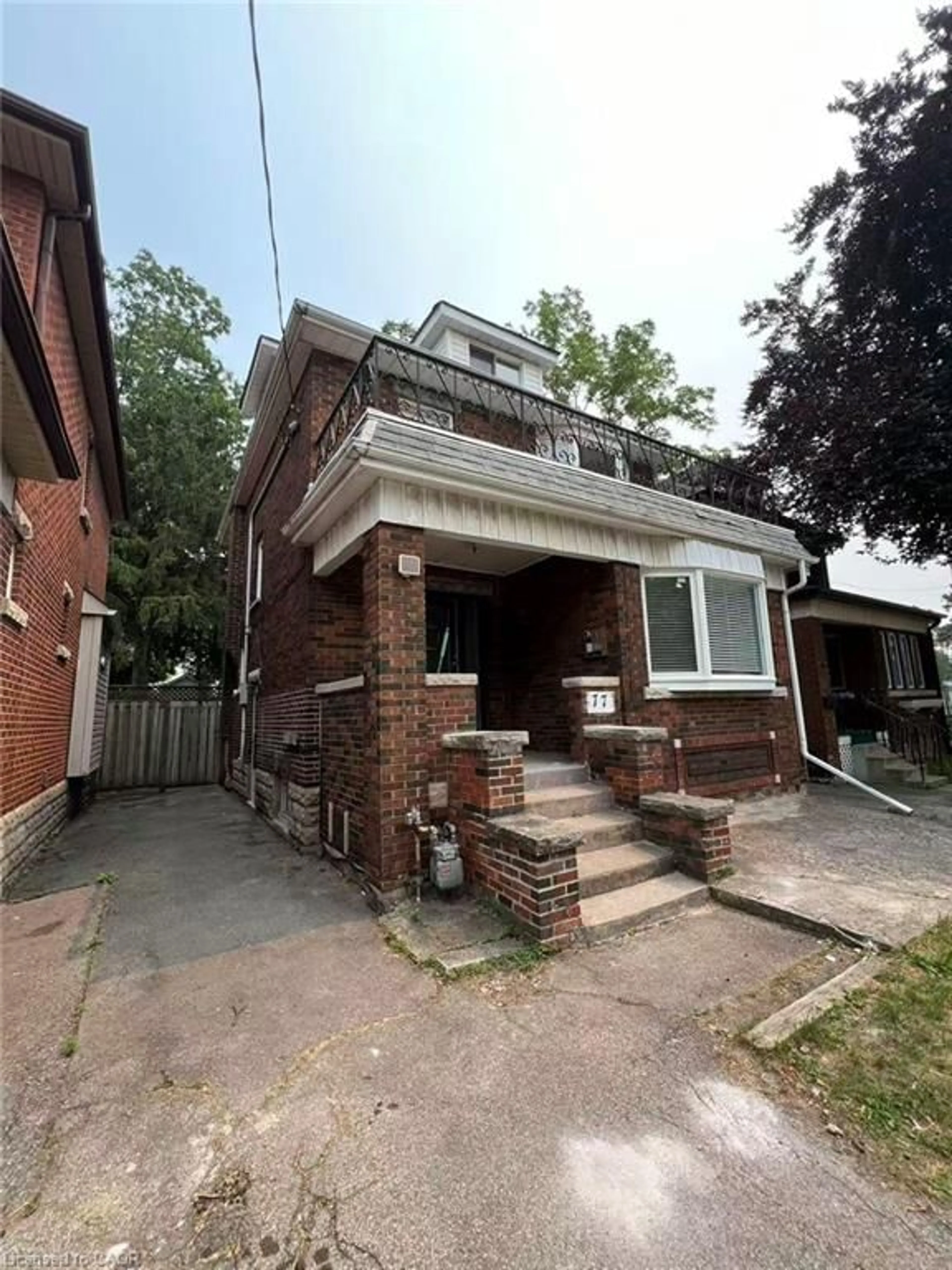 Home with brick exterior material, street for 77 Paisley Ave, Hamilton Ontario L8S 1V4