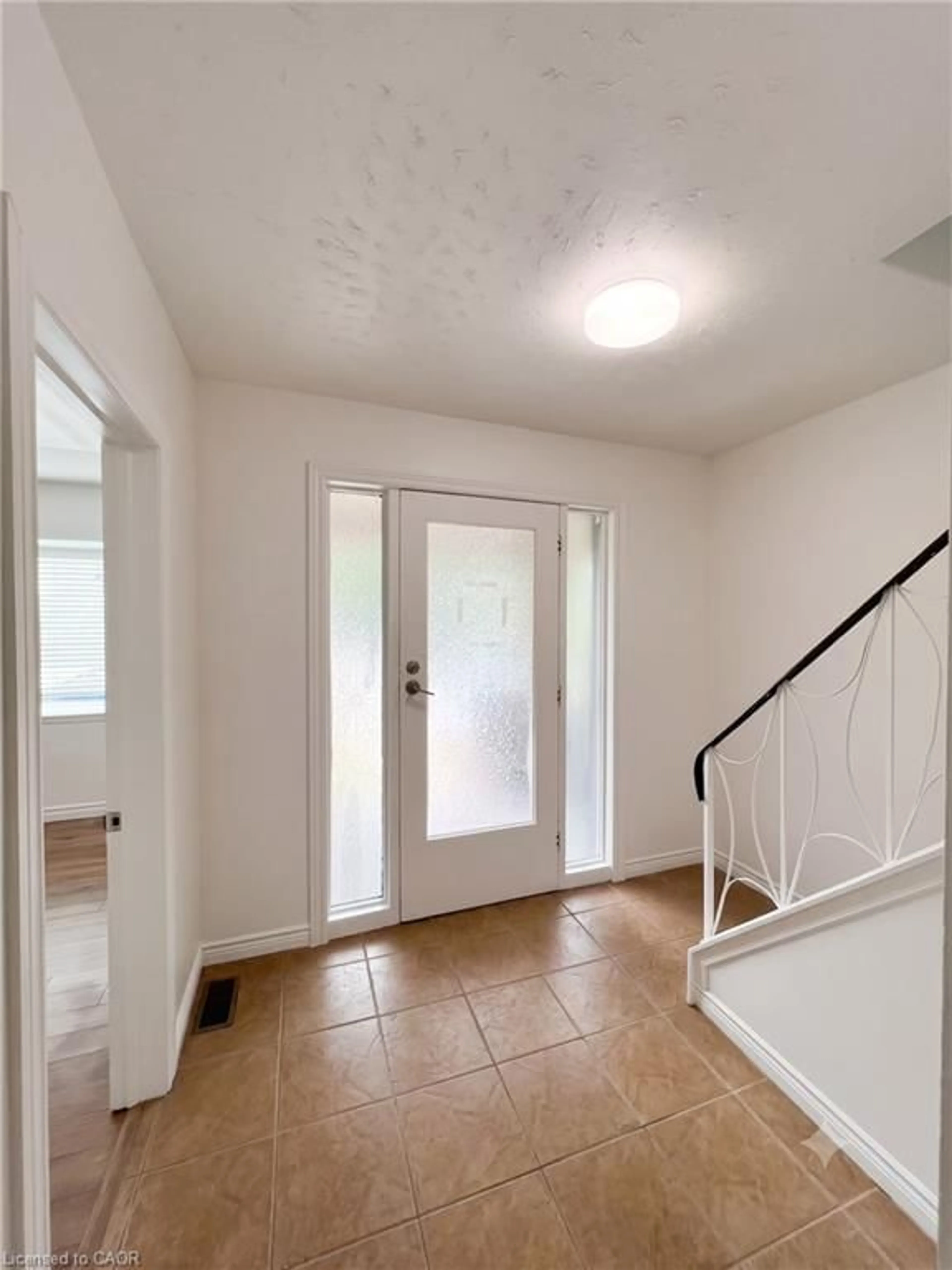 Indoor entryway for 77 Paisley Ave, Hamilton Ontario L8S 1V4