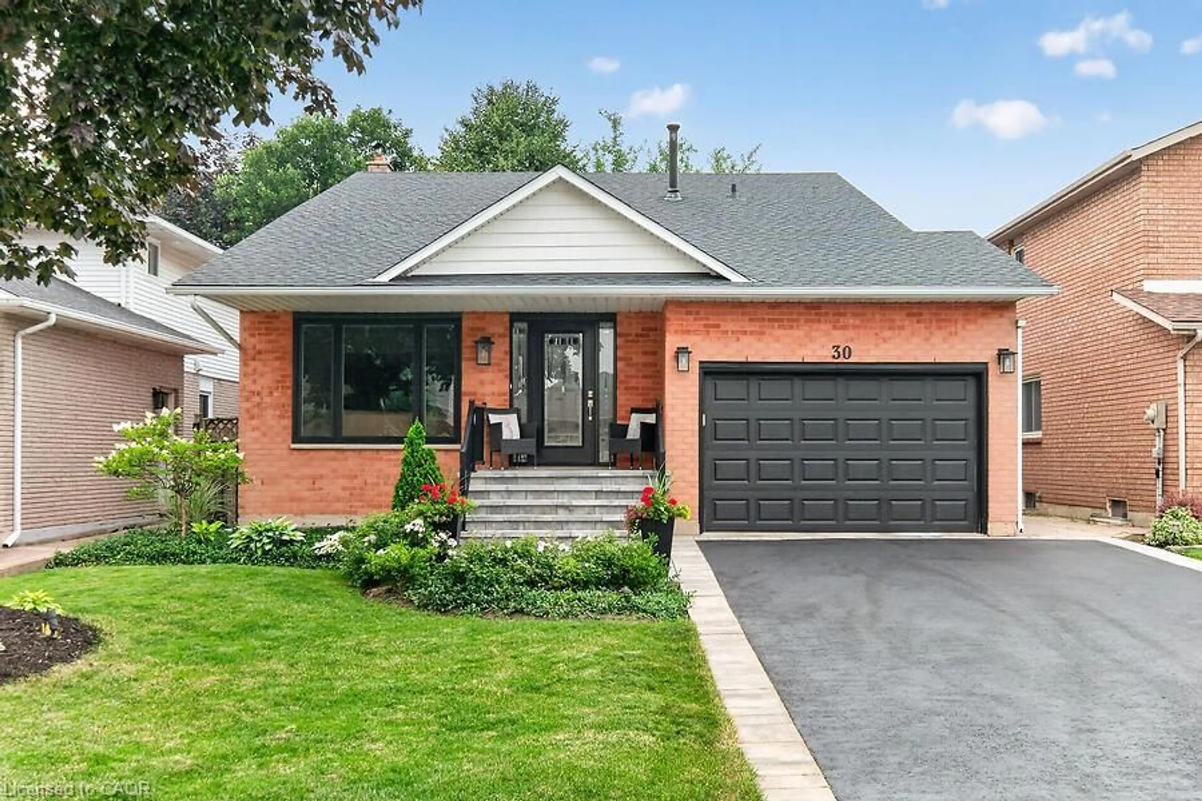 Home with brick exterior material, street for 30 Carriagegate Dr, Hamilton Ontario L8V 5A7