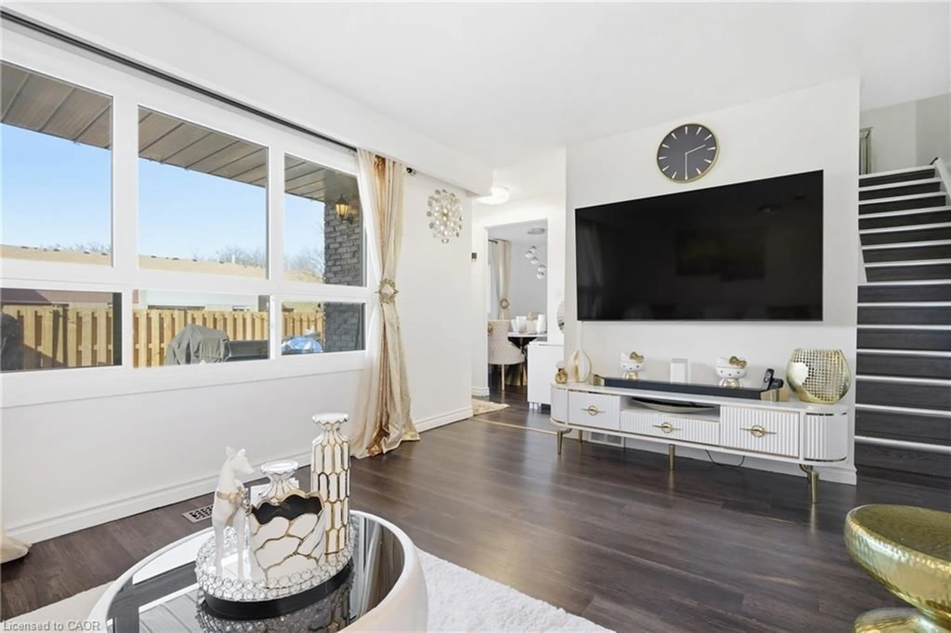 Living room with furniture, wood/laminate floor for 423 Westwood Dr #43, Kitchener Ontario N2M 5B5