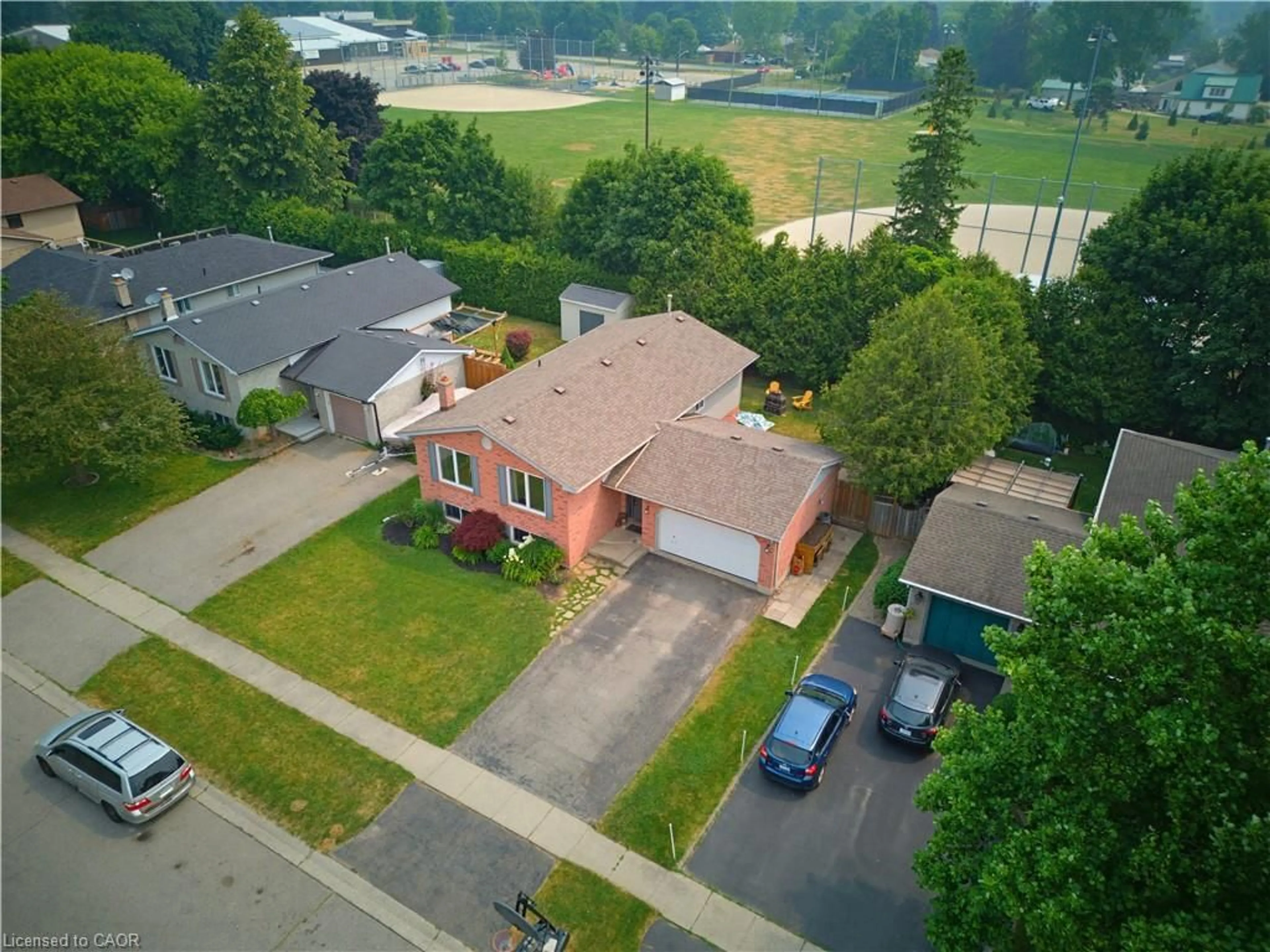 A pic from outside/outdoor area/front of a property/back of a property/a pic from drone, street for 24 Edward Ave, St. George Ontario N0E 1N0
