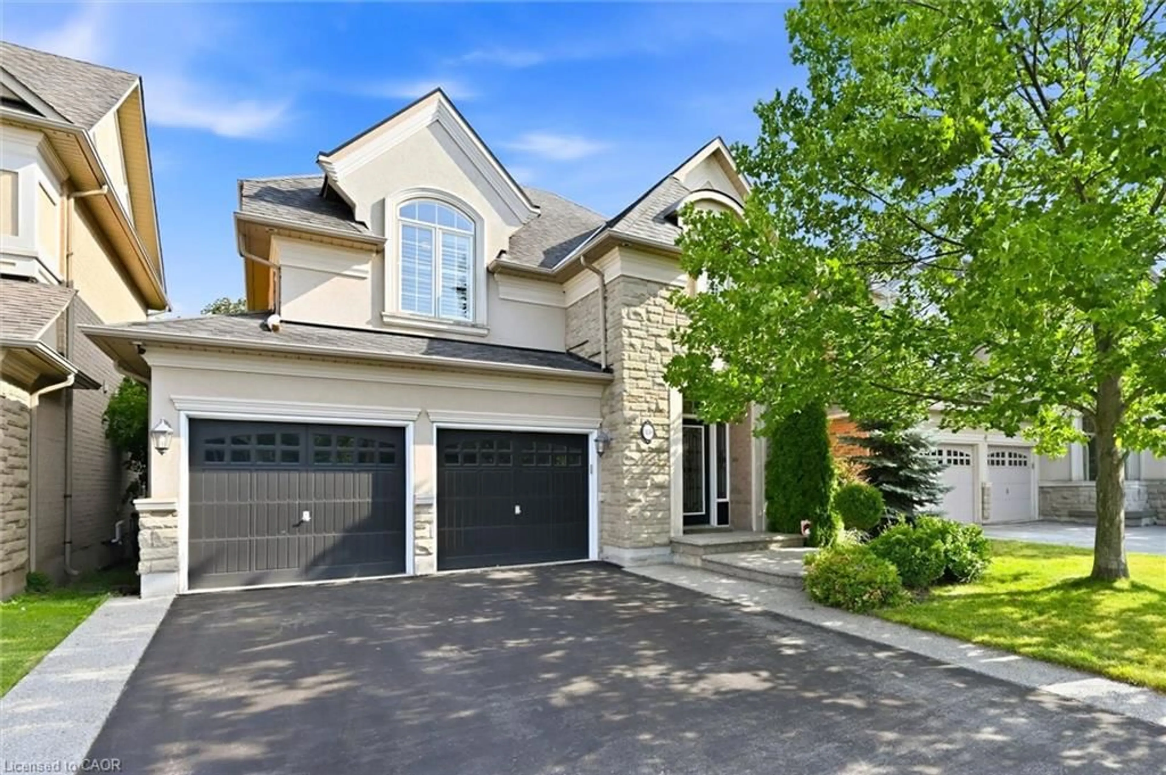 Home with brick exterior material, street for 320 Turning Leaf Rd, Oakville Ontario L6L 6W7