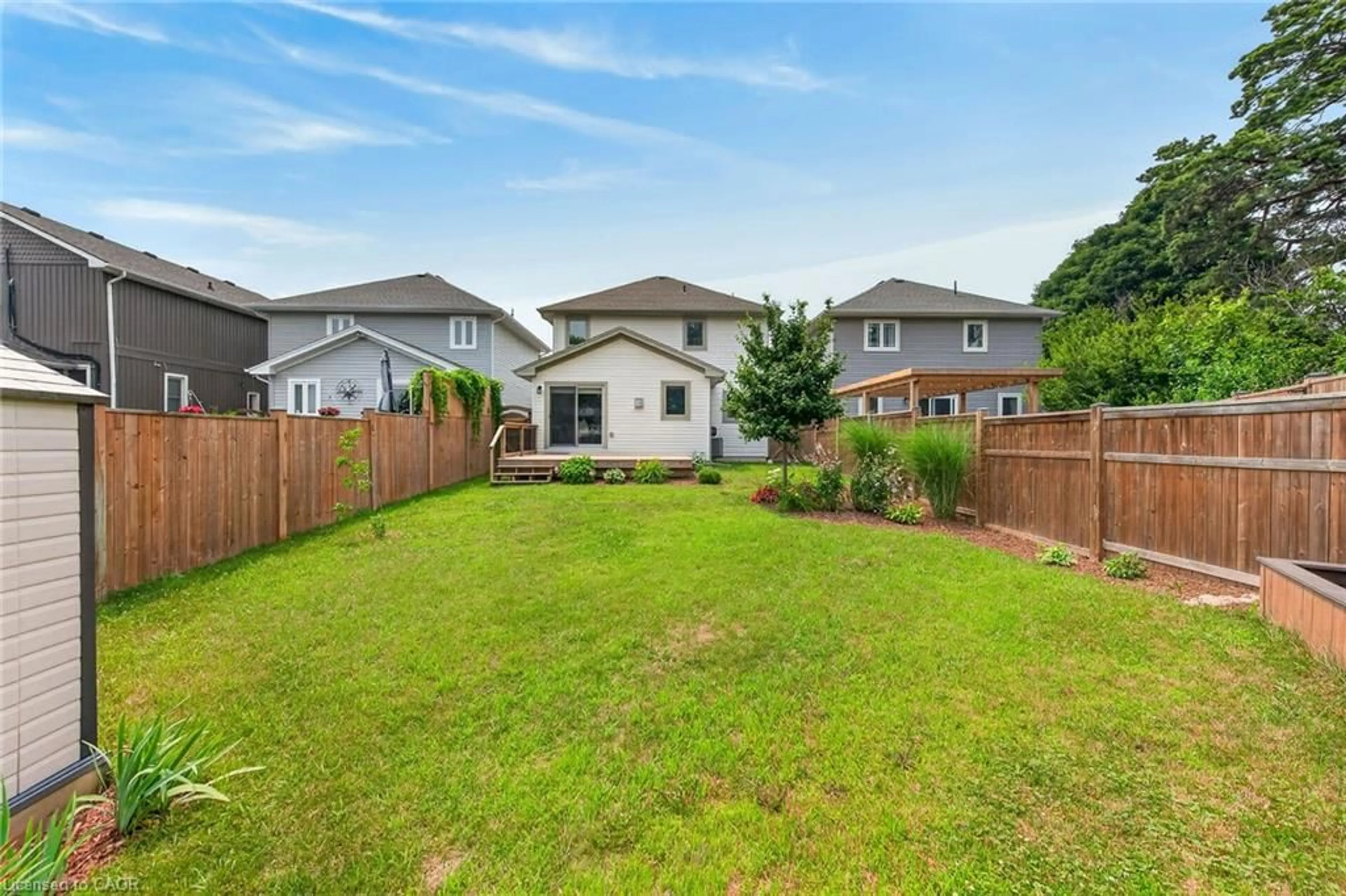 A pic from outside/outdoor area/front of a property/back of a property/a pic from drone, unknown for 822 Main St, Port Dover Ontario N0A 1N0