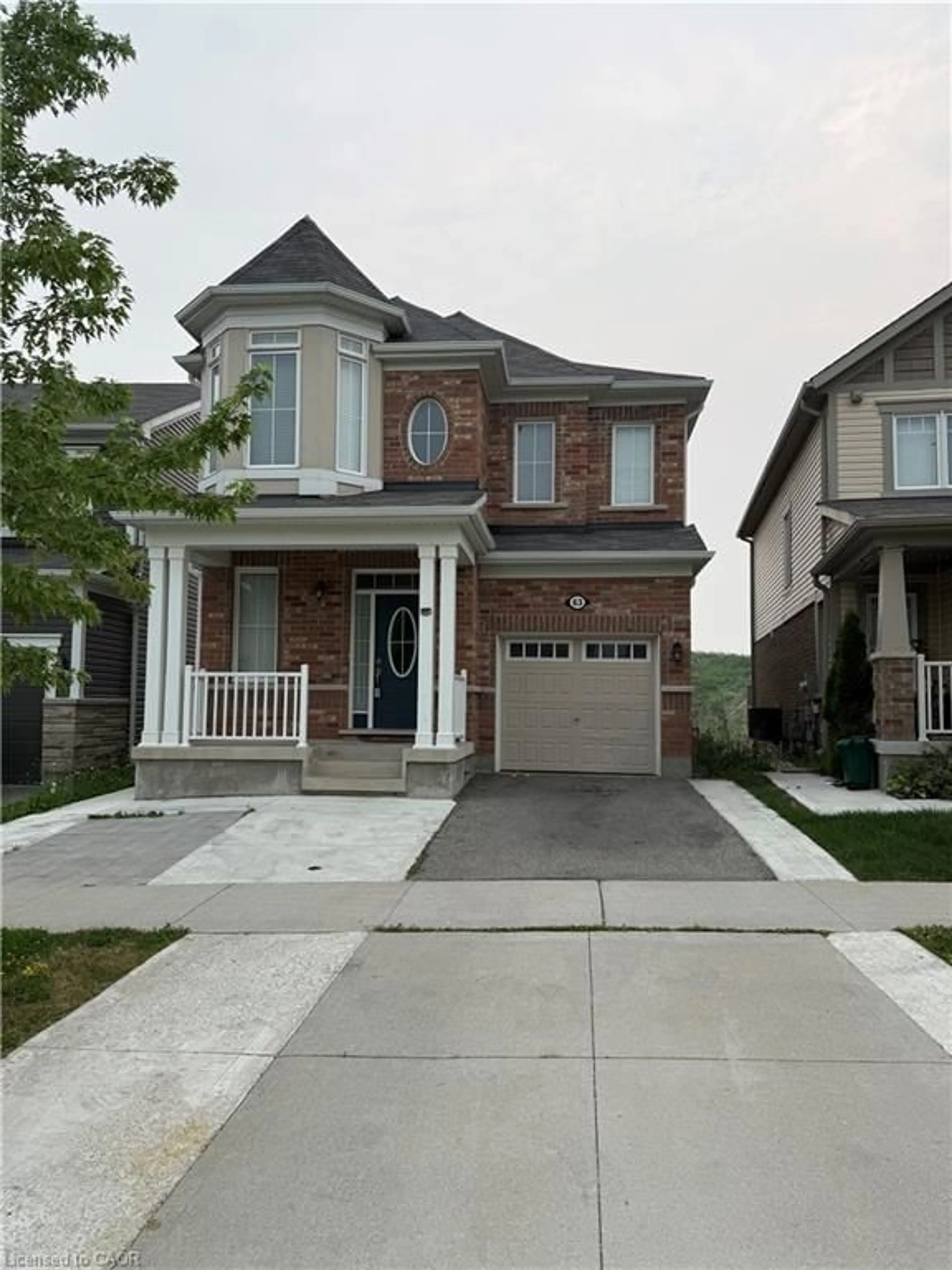 Home with brick exterior material, street for 63 Ridge Rd, Cambridge Ontario N3E 0C6