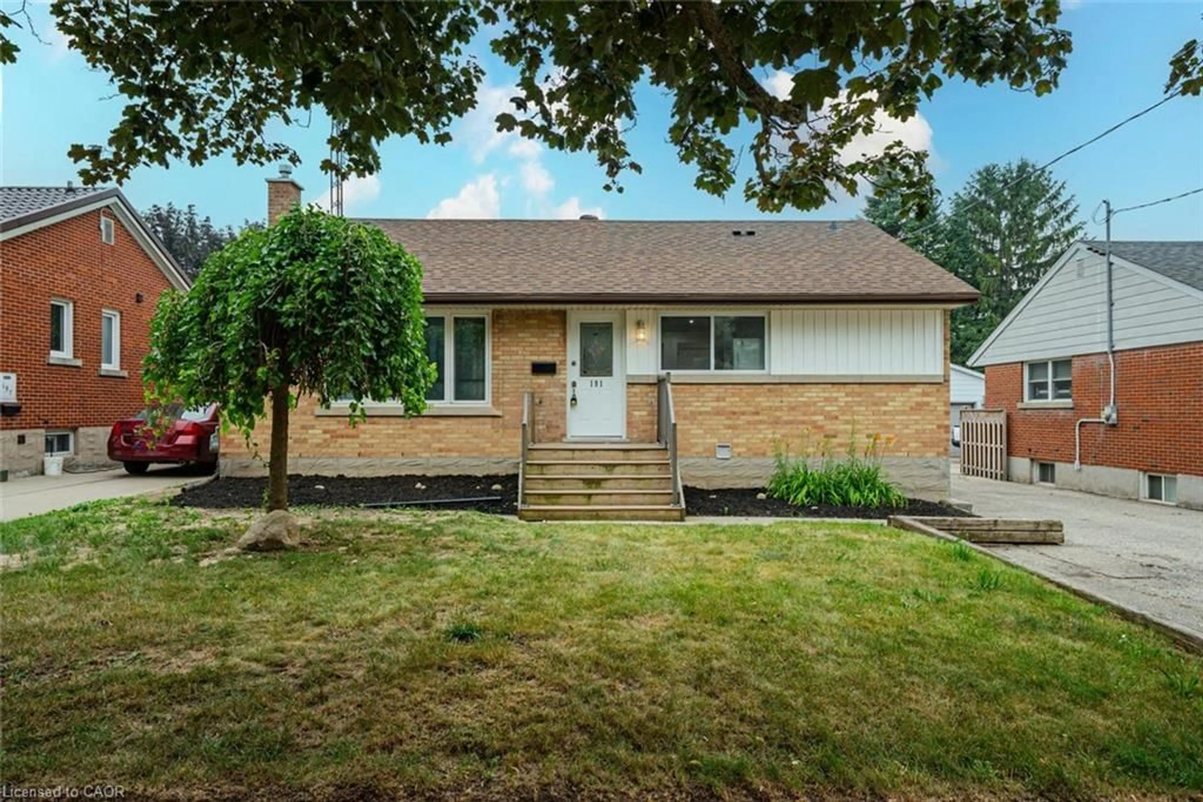 Home with brick exterior material, street for 191 Clark Ave, Kitchener Ontario N2C 1Y1