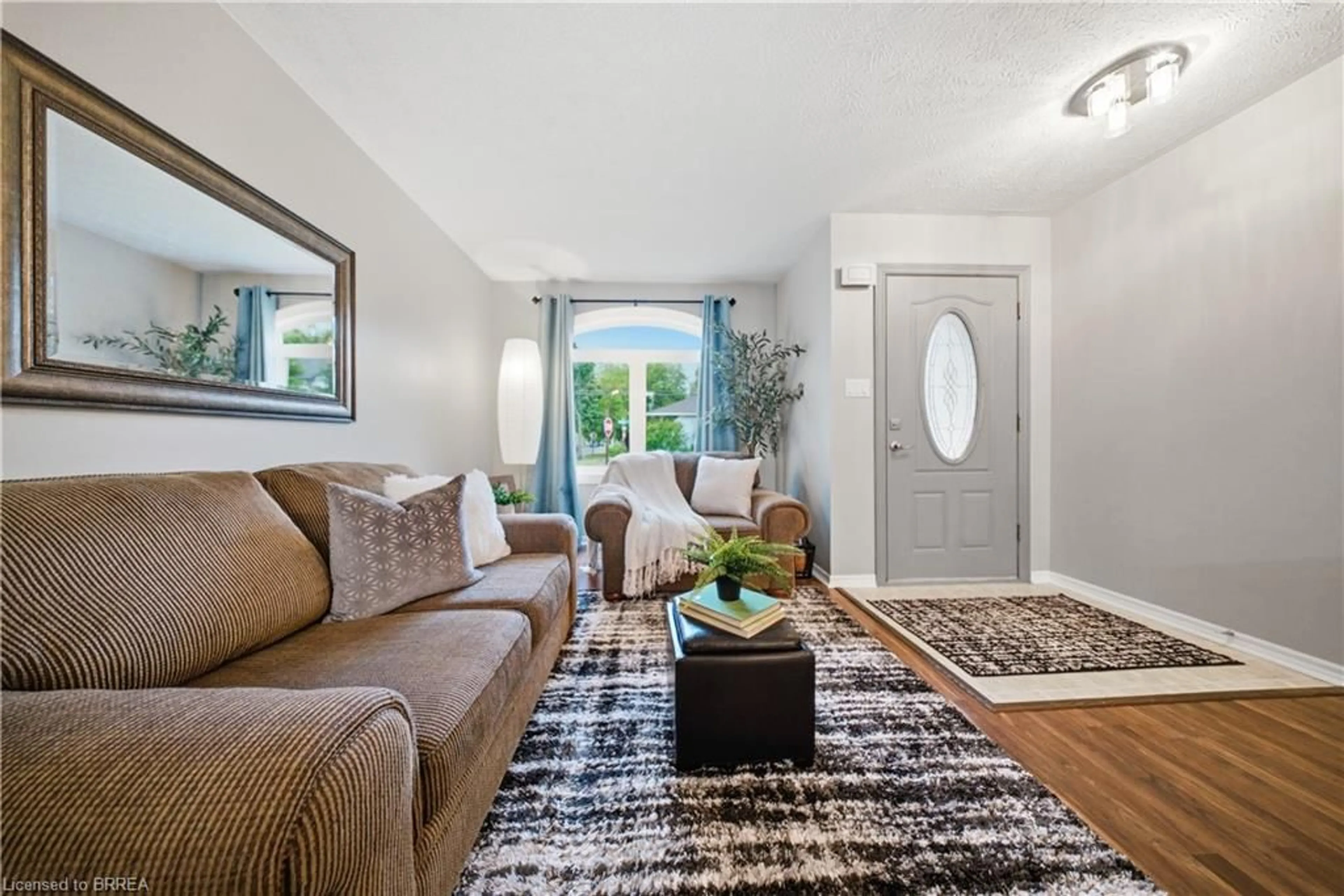 Living room with furniture, unknown for 58 Waterloo St #4, Brantford Ontario N3T 3R8
