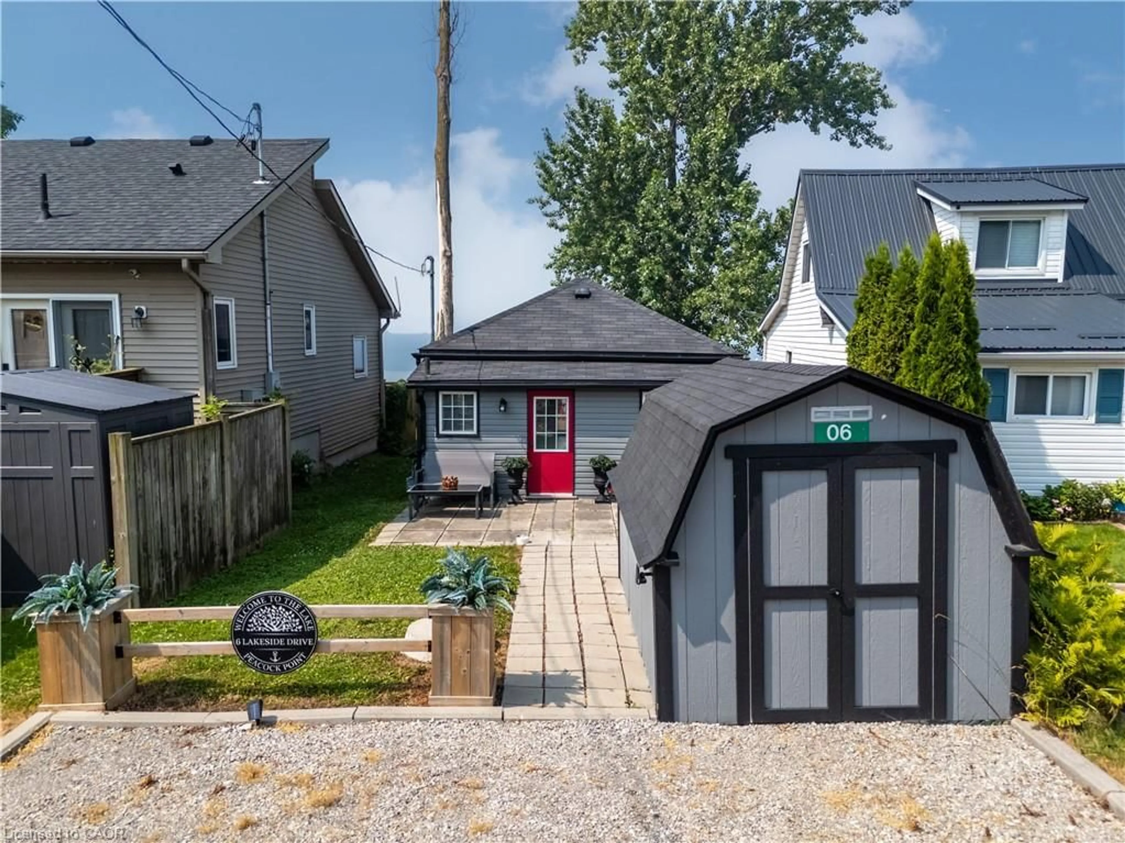 A pic from outside/outdoor area/front of a property/back of a property/a pic from drone, street for 6 Lakeside Dr, Nanticoke Ontario N0A 1L0