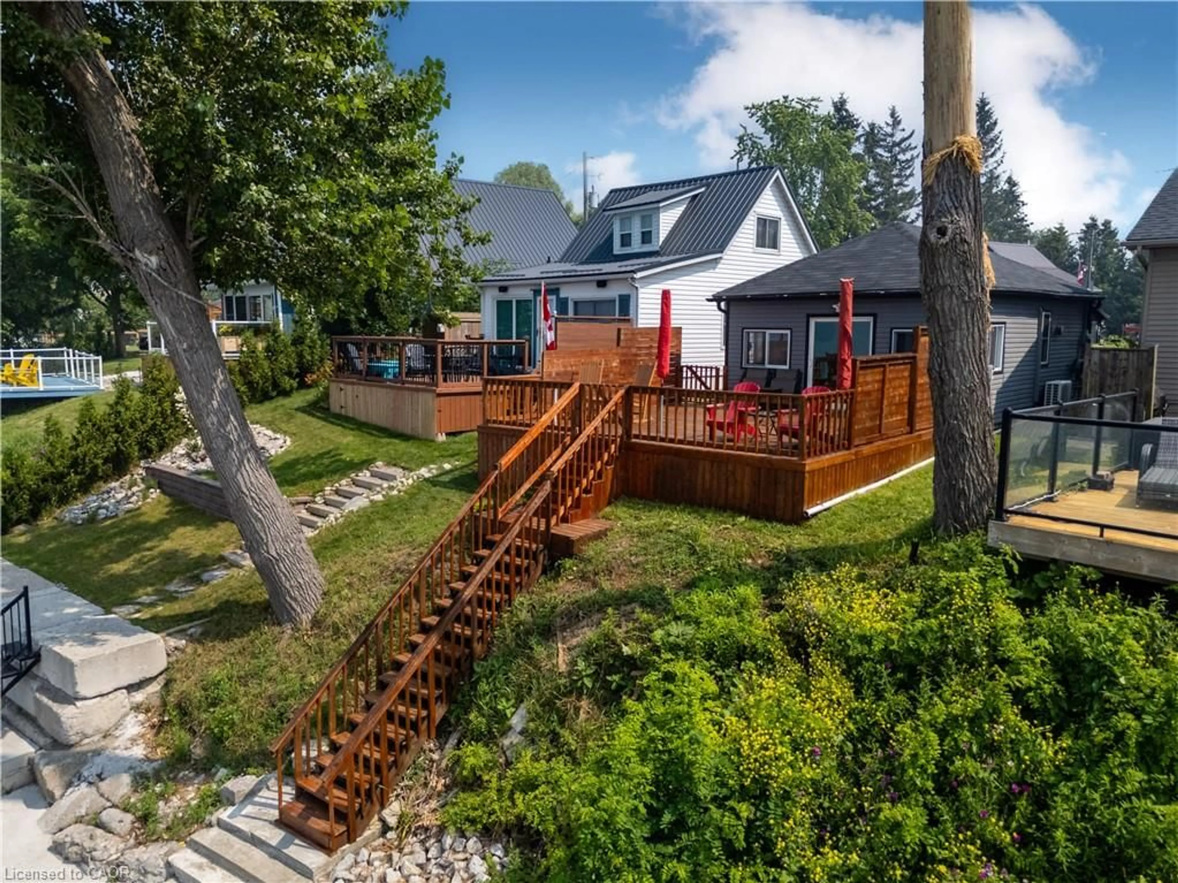 A pic from outside/outdoor area/front of a property/back of a property/a pic from drone, water/lake/river/ocean view for 6 Lakeside Dr, Nanticoke Ontario N0A 1L0