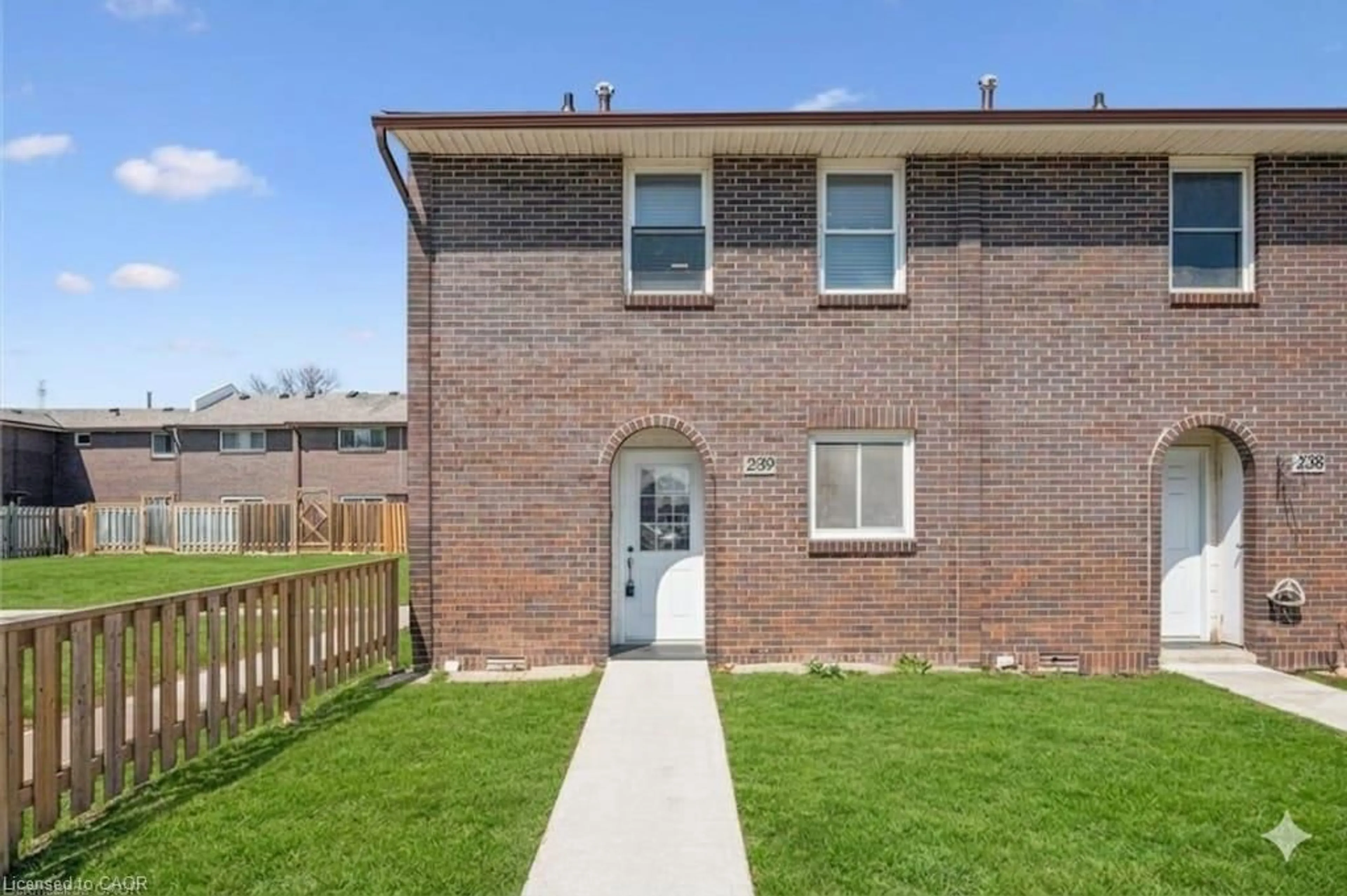 Home with brick exterior material, street for 31 Greengate Rd #239, Guelph Ontario N1H 6R3