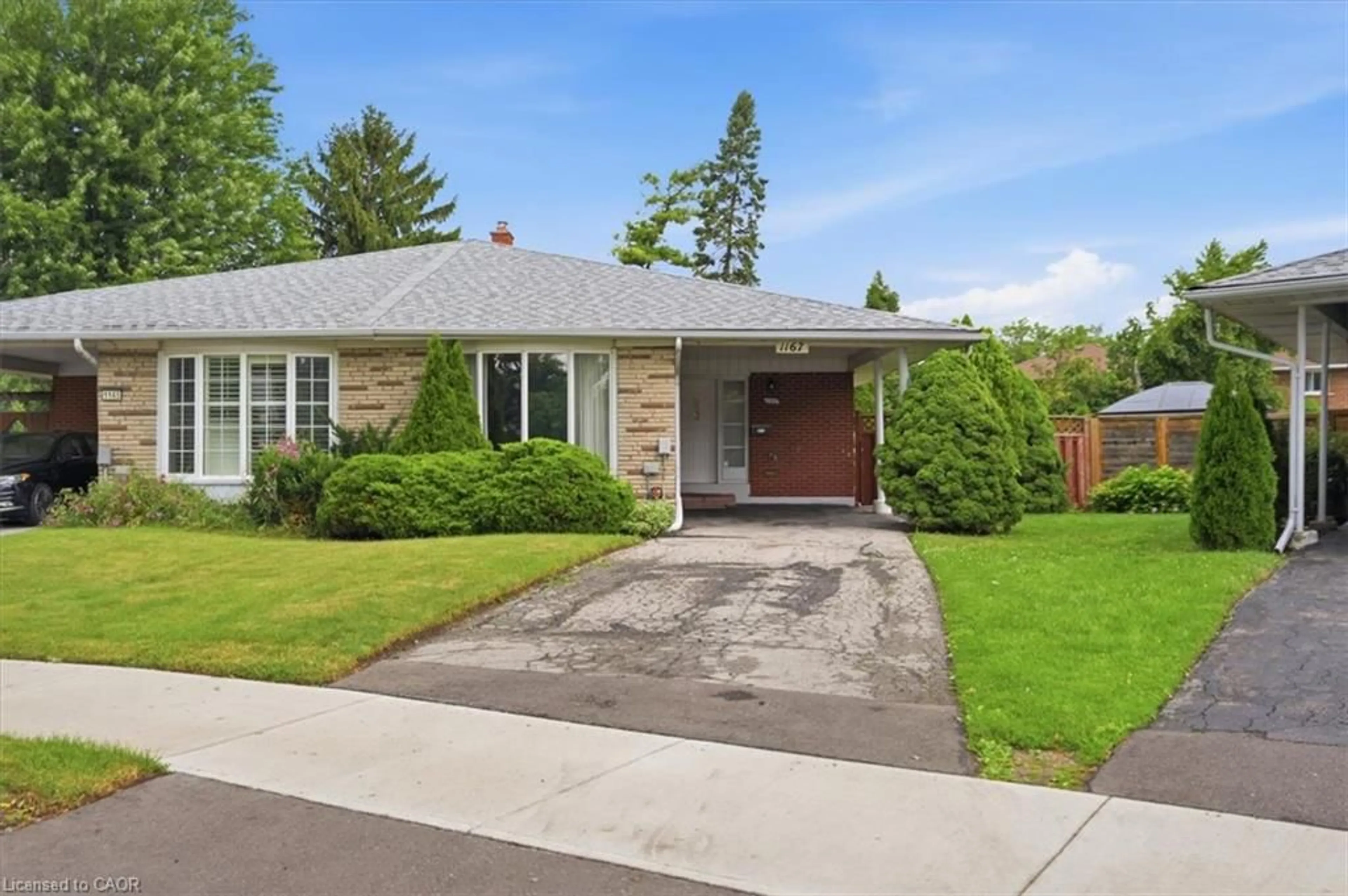 Home with brick exterior material, street for 1167 Saturnia Cres, Mississauga Ontario L4Y 2M2