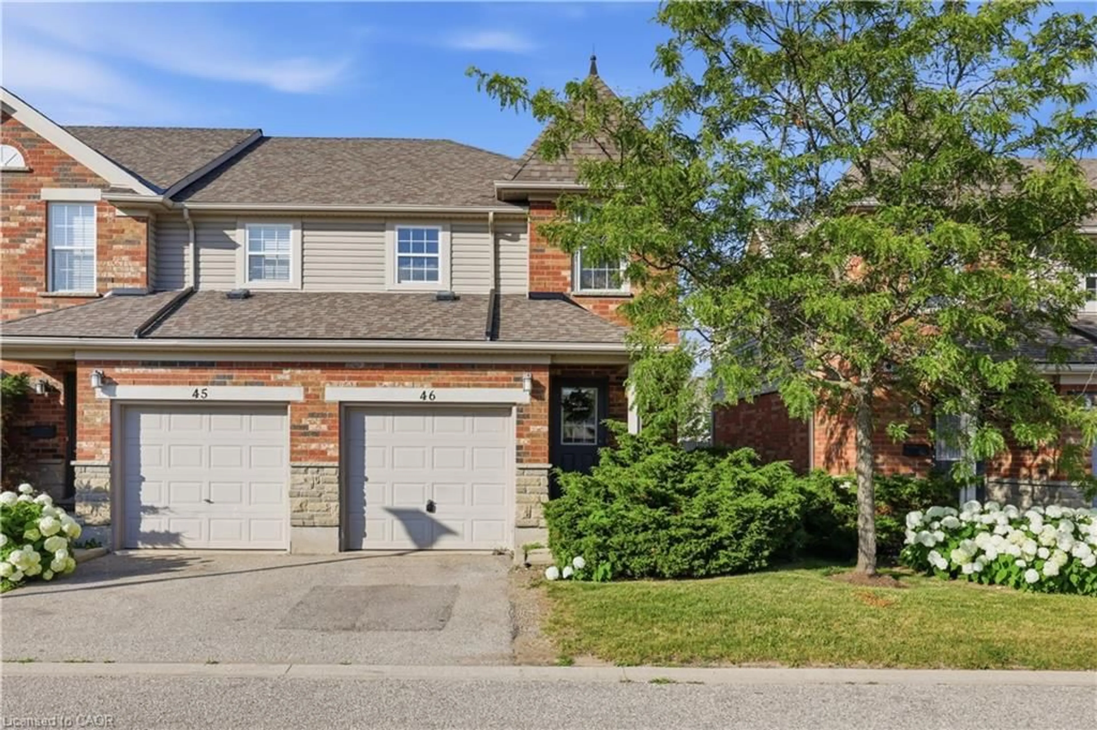 Home with brick exterior material, street for 124 Gosling Gdns #46, Guelph Ontario N1G 5K6