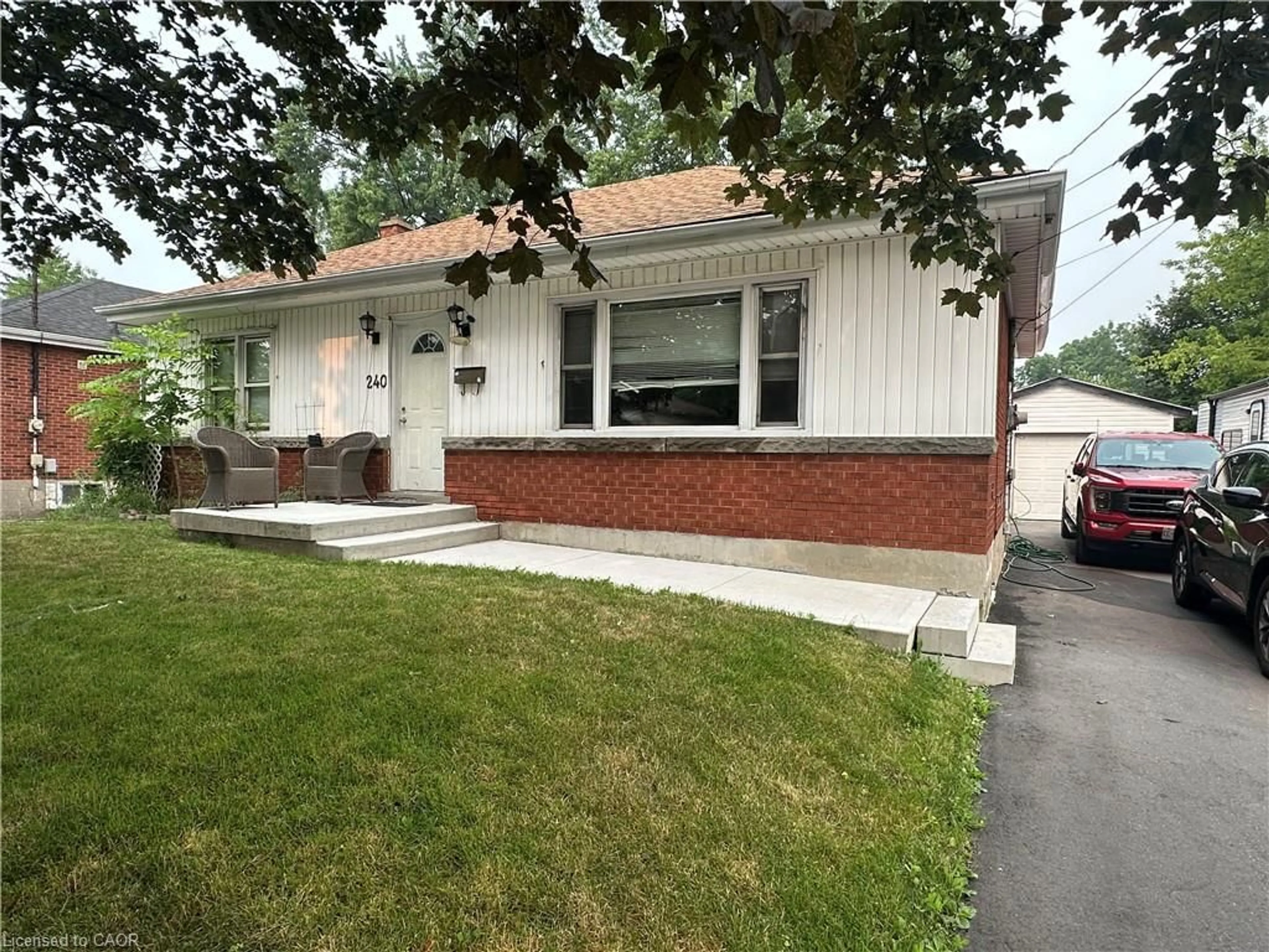 Home with vinyl exterior material, street for 240 West 2nd St, Hamilton Ontario L9C 3G5