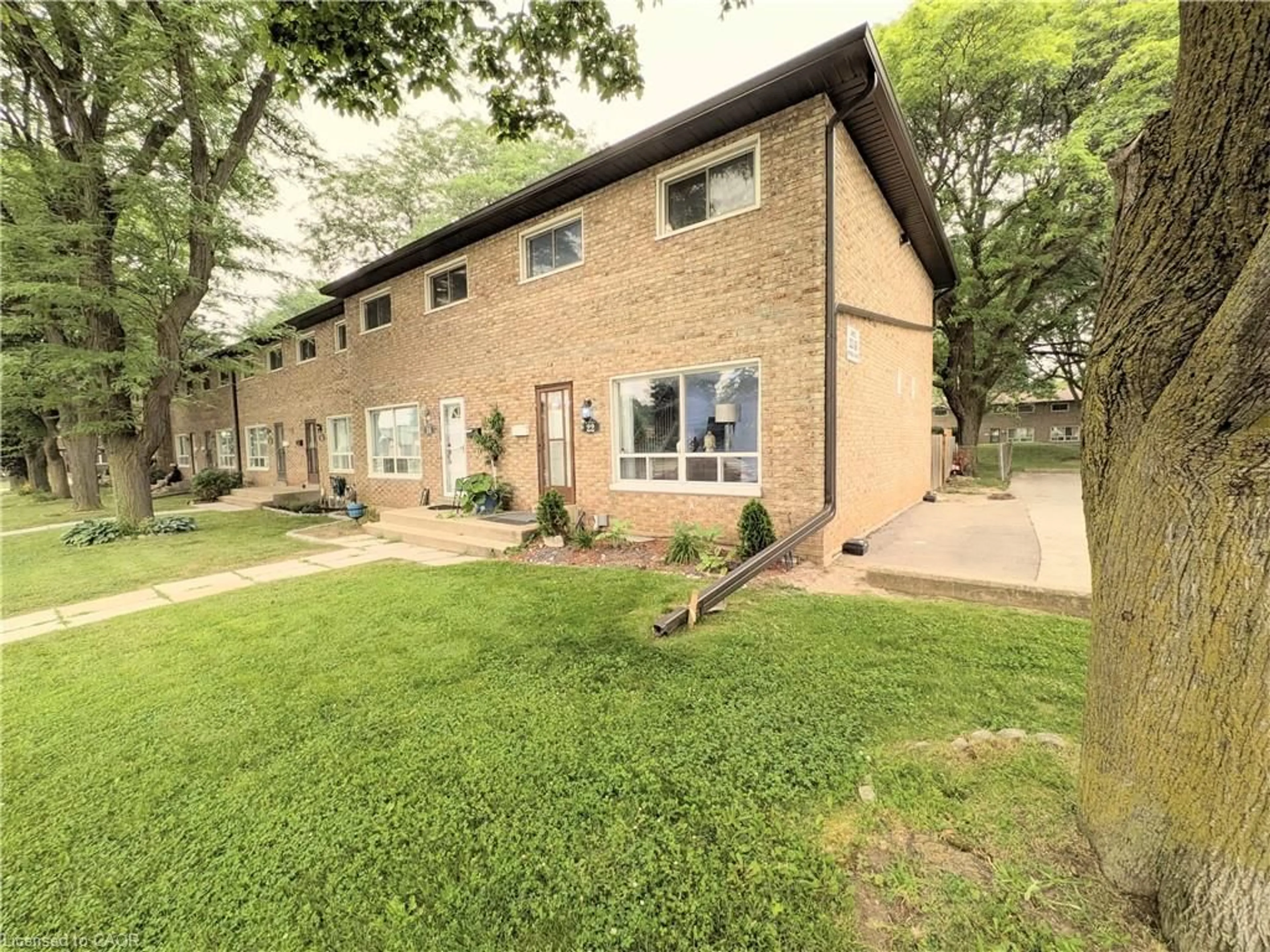 A pic from outside/outdoor area/front of a property/back of a property/a pic from drone, street for 22 Riverdale Dr #1, Hamilton Ontario L8E 1J8