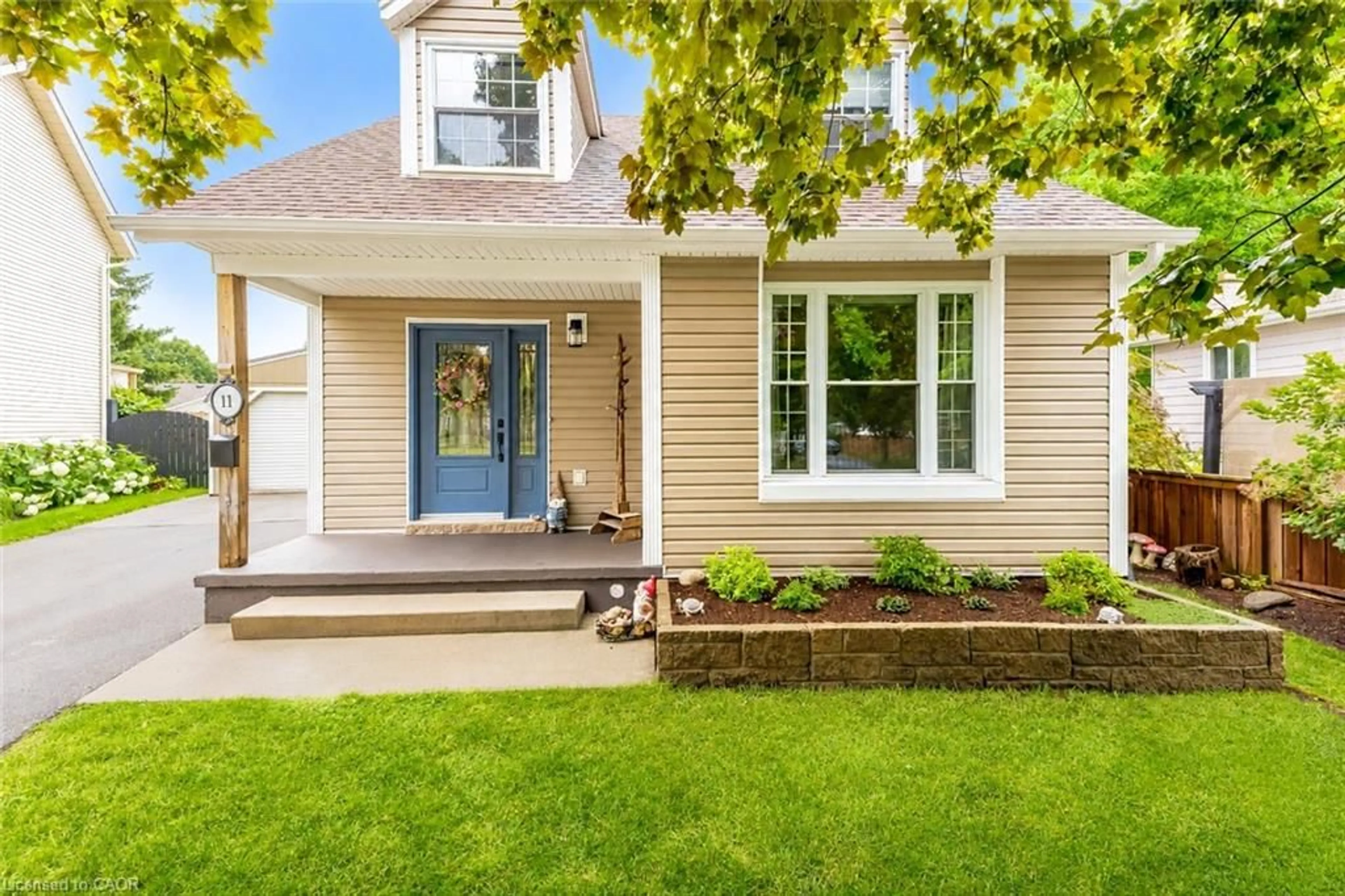 Home with vinyl exterior material, street for 11 Nipigon Pl, Kitchener Ontario N2B 3N5