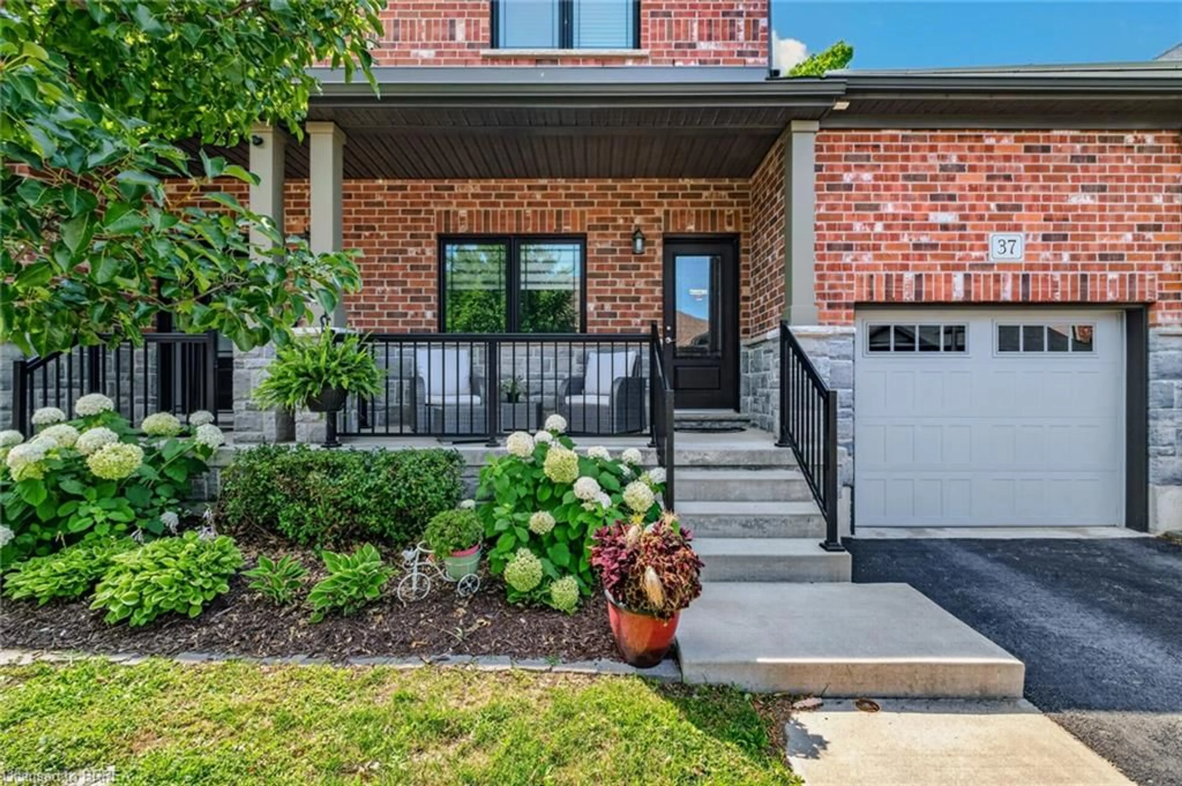 Home with brick exterior material, street for 37 Serviceberry Lane, Simcoe Ontario N3Y 0E5