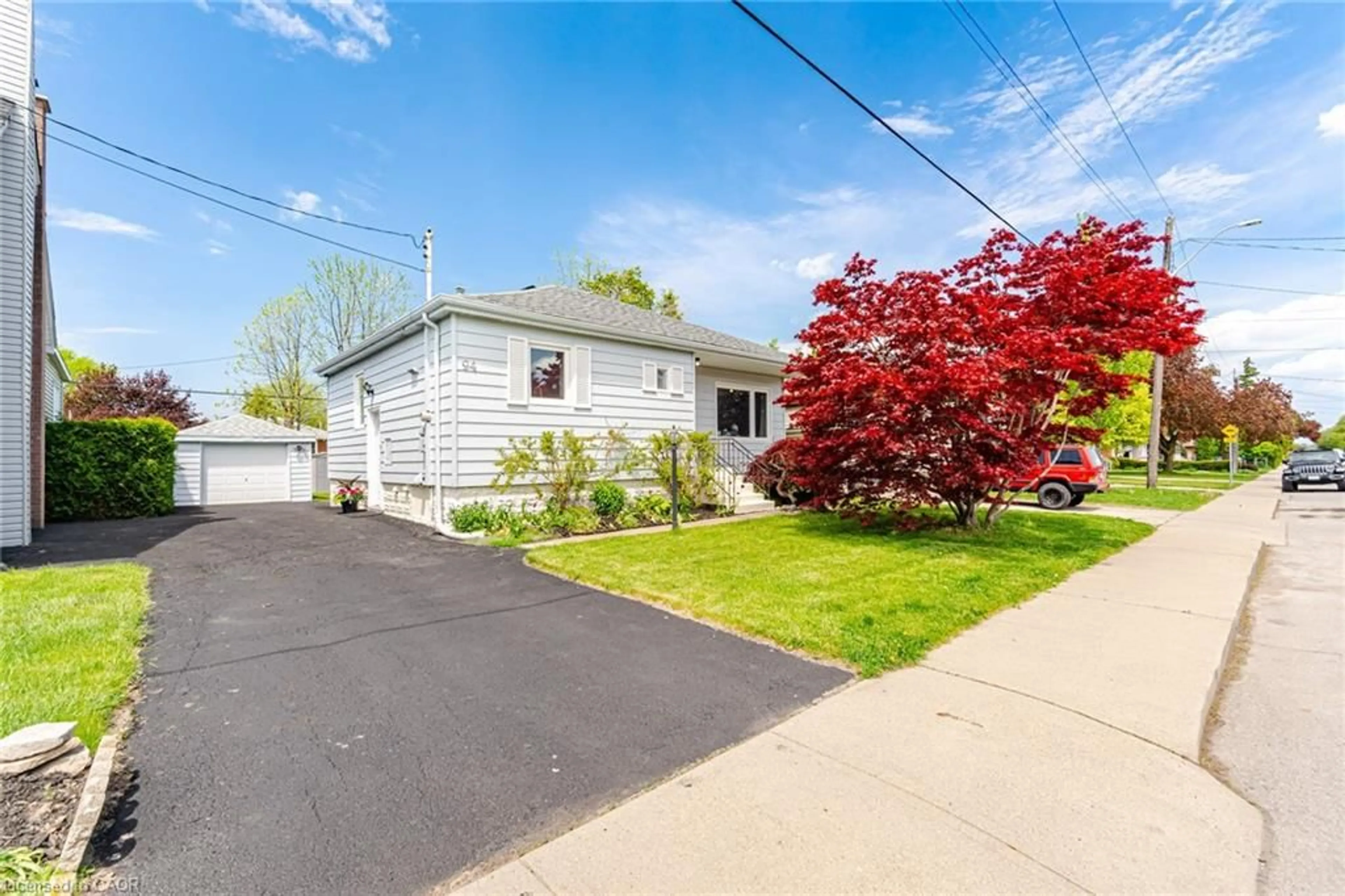 Home with vinyl exterior material, street for 94 Clarendon Ave, Hamilton Ontario L9A 3A3