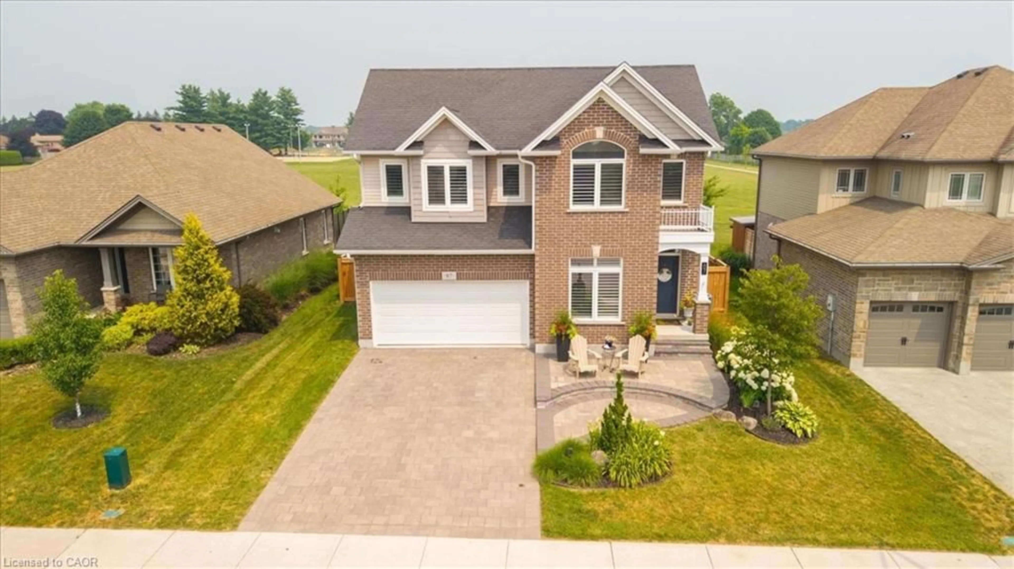 A pic from outside/outdoor area/front of a property/back of a property/a pic from drone, street for 87 Boyd Blvd, Thamesford Ontario N0M 2M0