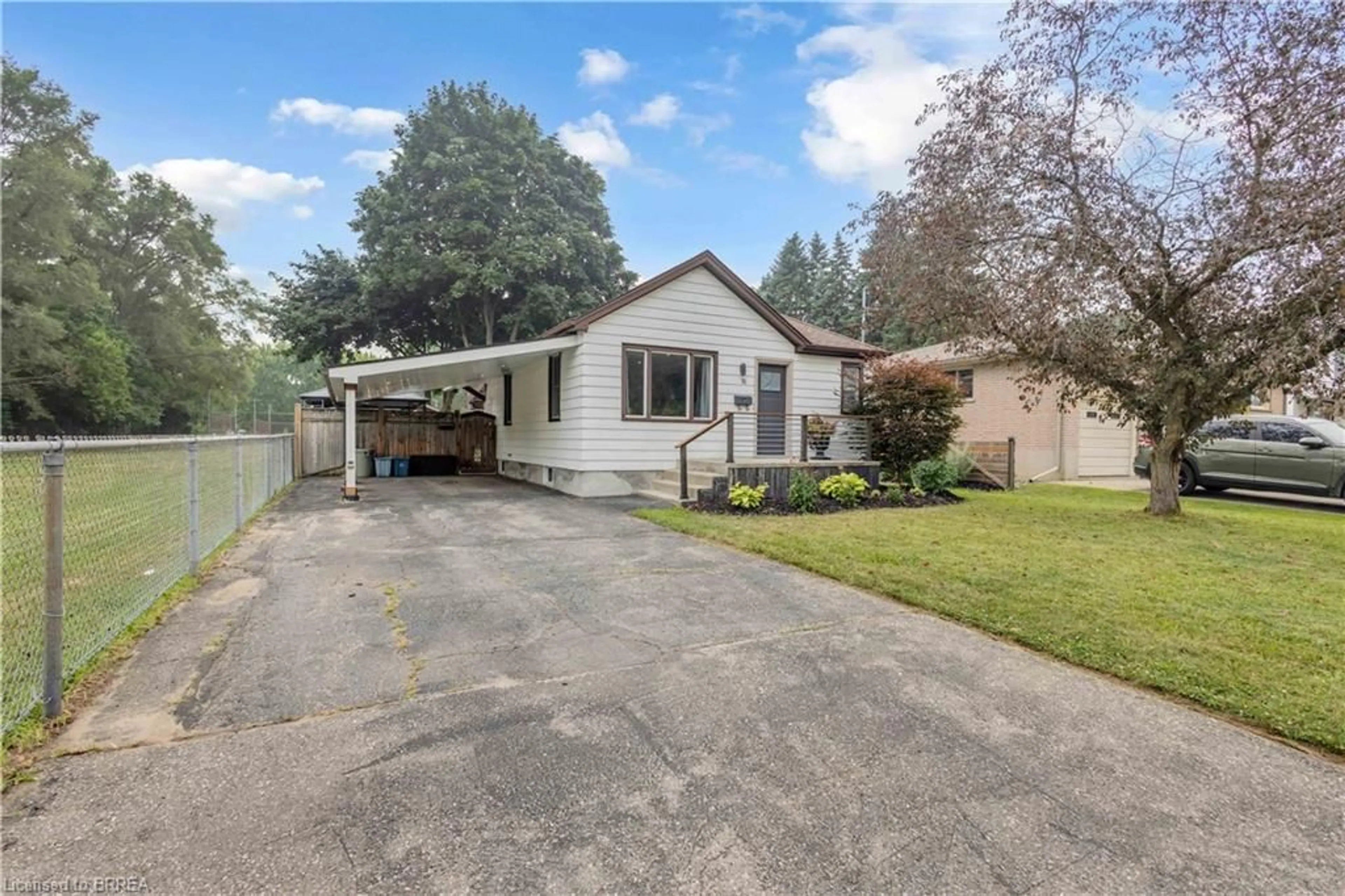 Home with vinyl exterior material, street for 76 Wood St, Brantford Ontario N3R 2L2