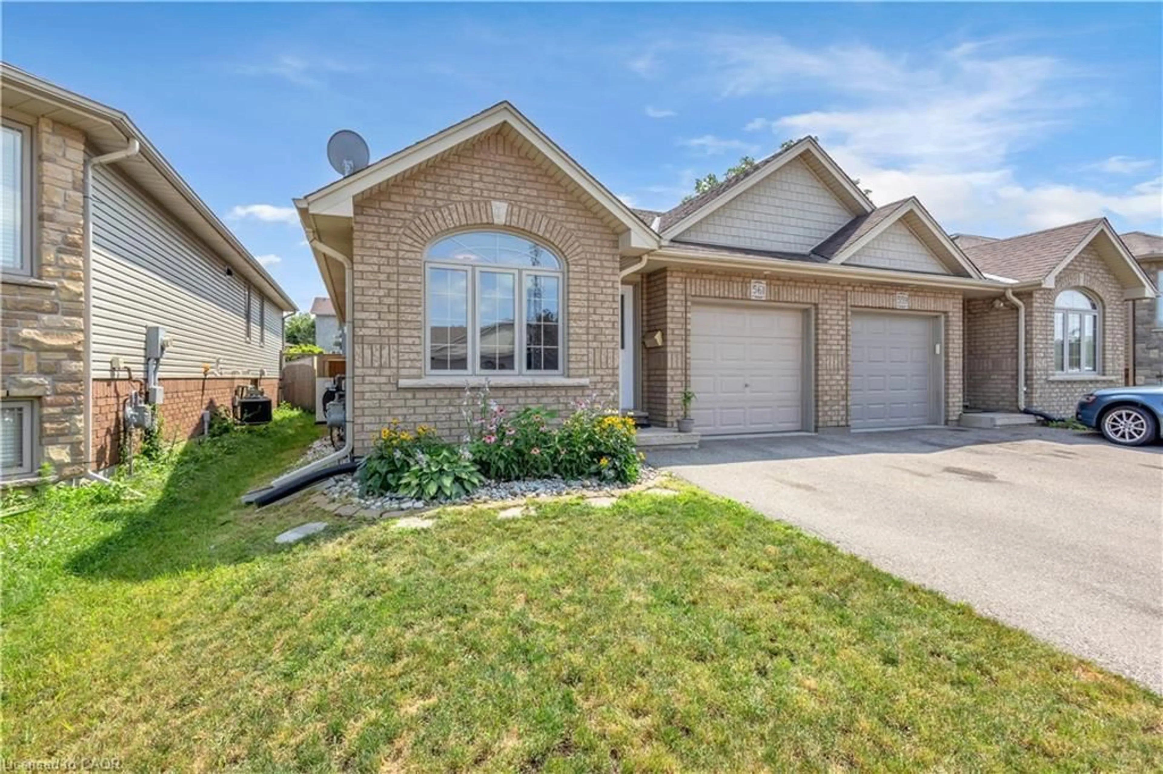 Home with brick exterior material, street for 561 Grey St, Brantford Ontario N3S 0C3
