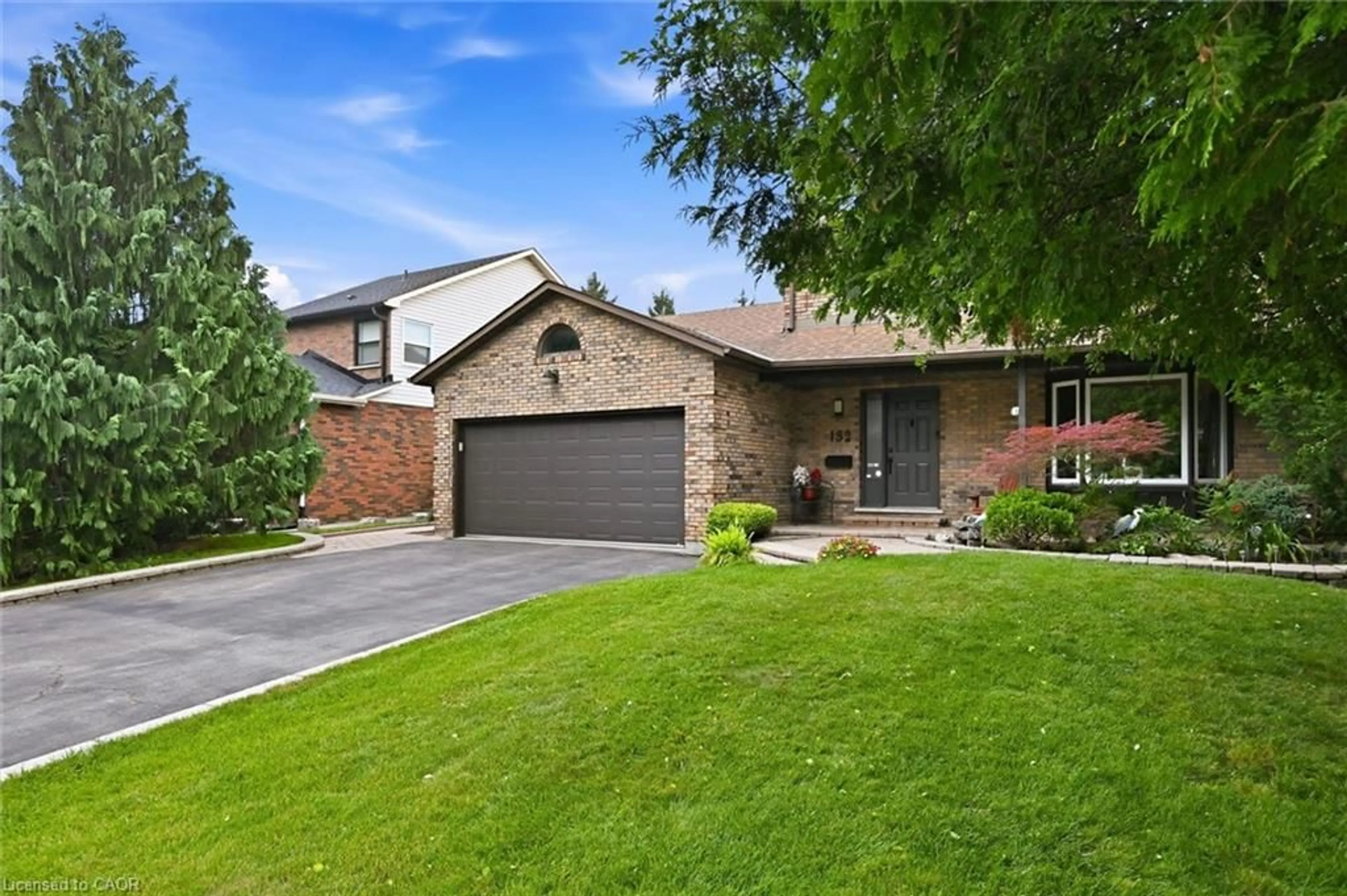 Home with brick exterior material, street for 132 Hampton Heath Rd, Burlington Ontario L7L 4N9