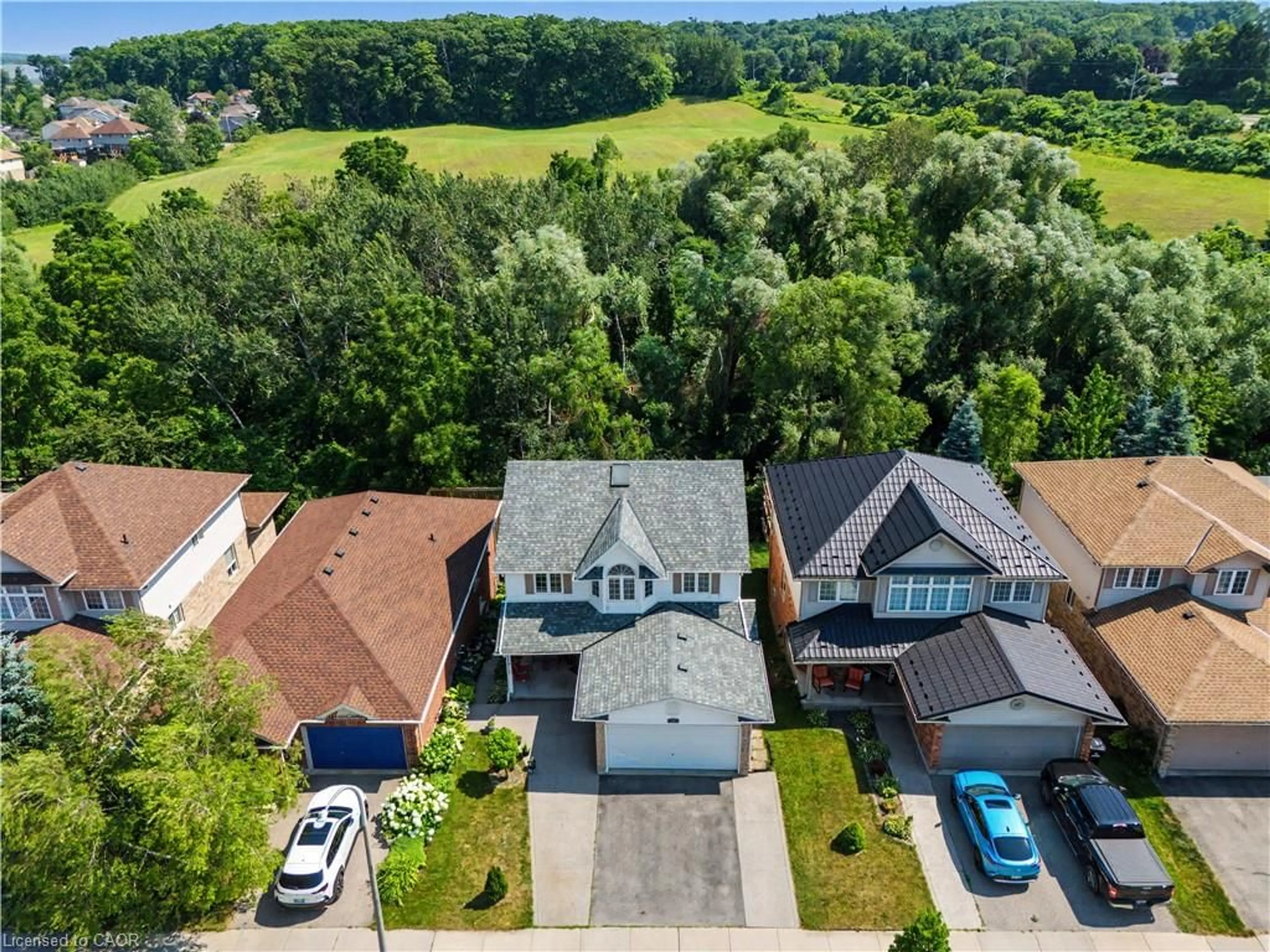A pic from outside/outdoor area/front of a property/back of a property/a pic from drone, water/lake/river/ocean view for 63 Brisbane Dr, Kitchener Ontario N2C 2T6