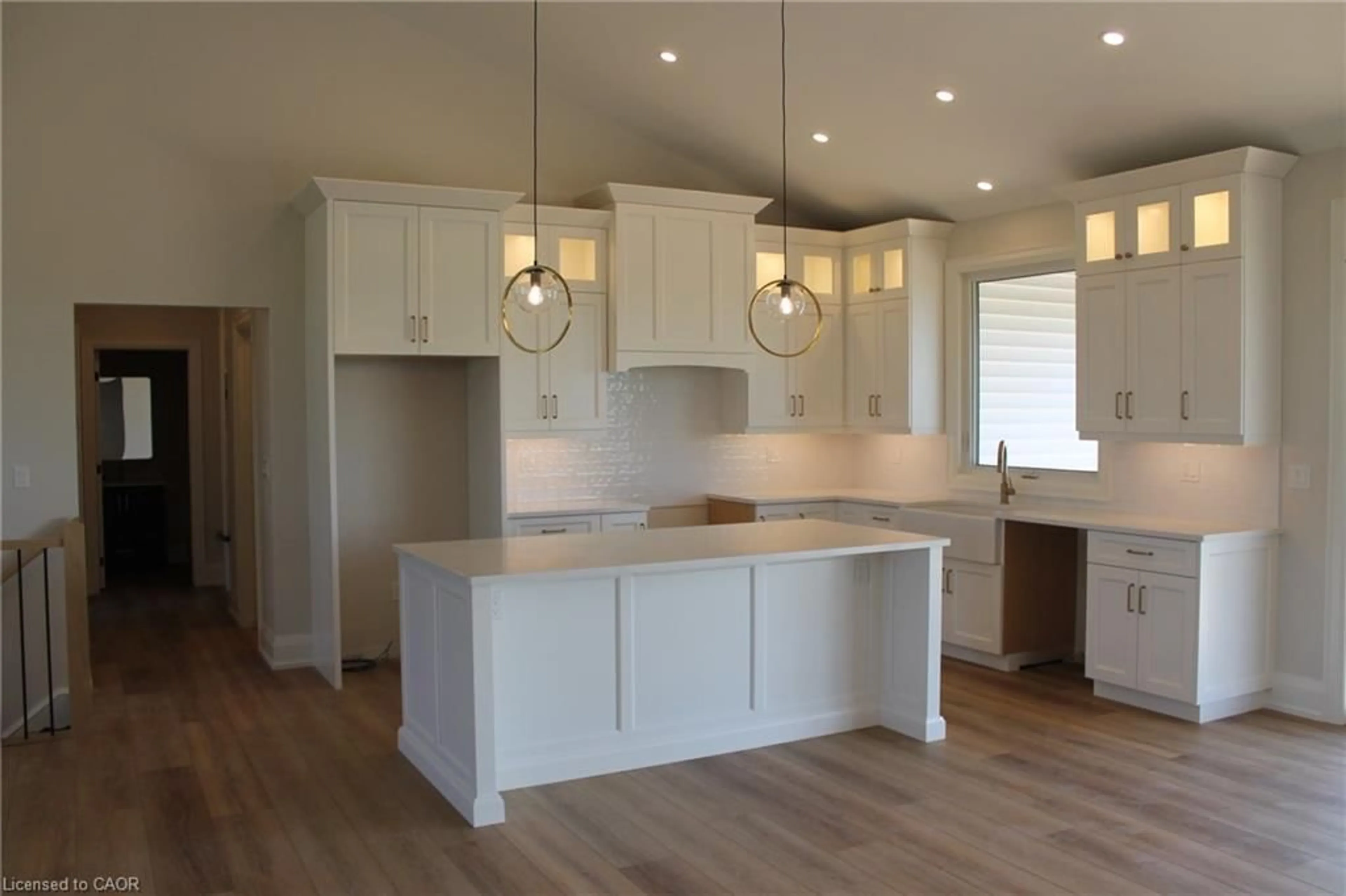Open concept kitchen, wood/laminate floor for 348 Hart Rd, Dunnville Ontario N1A 2W1
