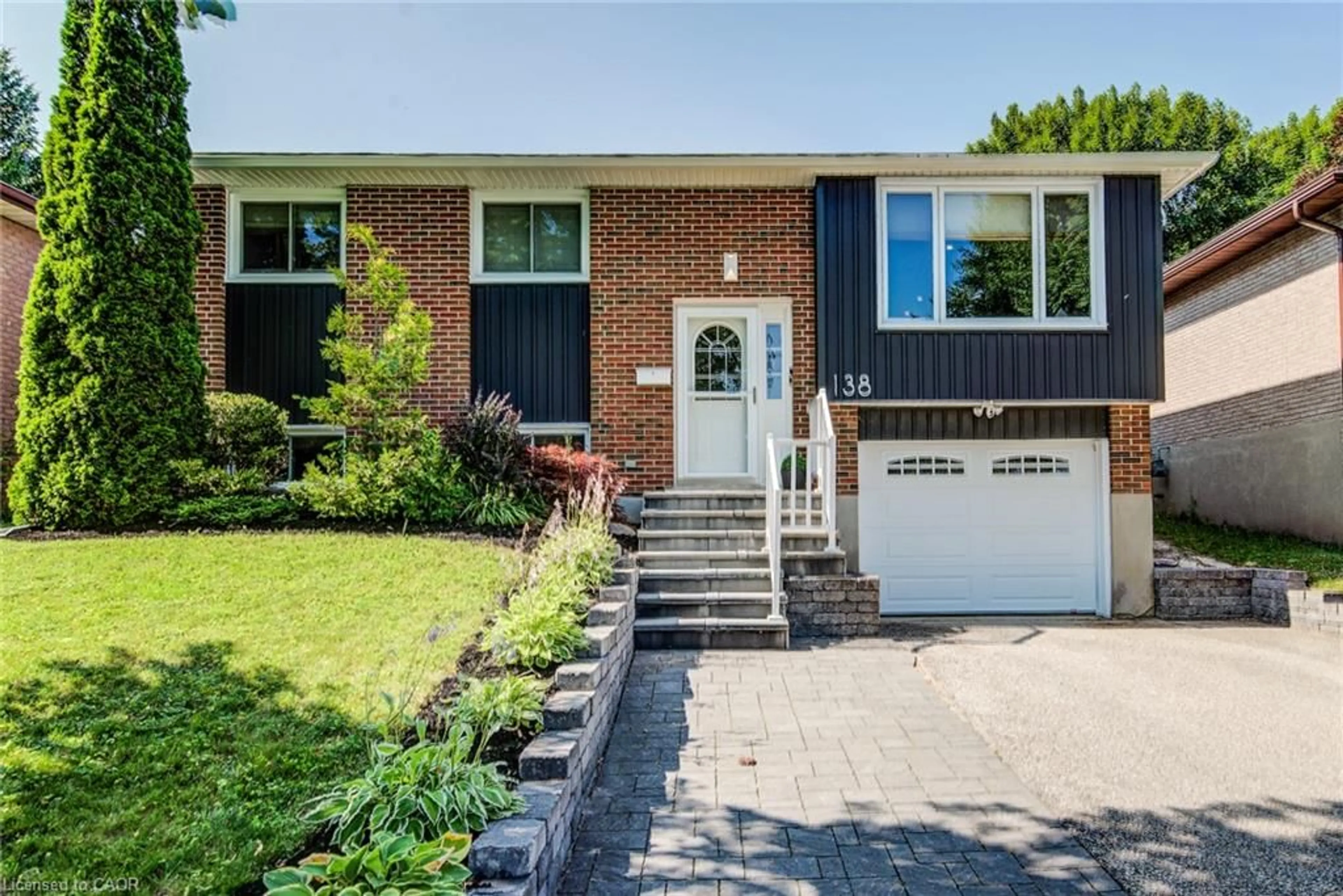 Home with brick exterior material, street for 138 Morningdale Cres, Waterloo Ontario N2V 1E6