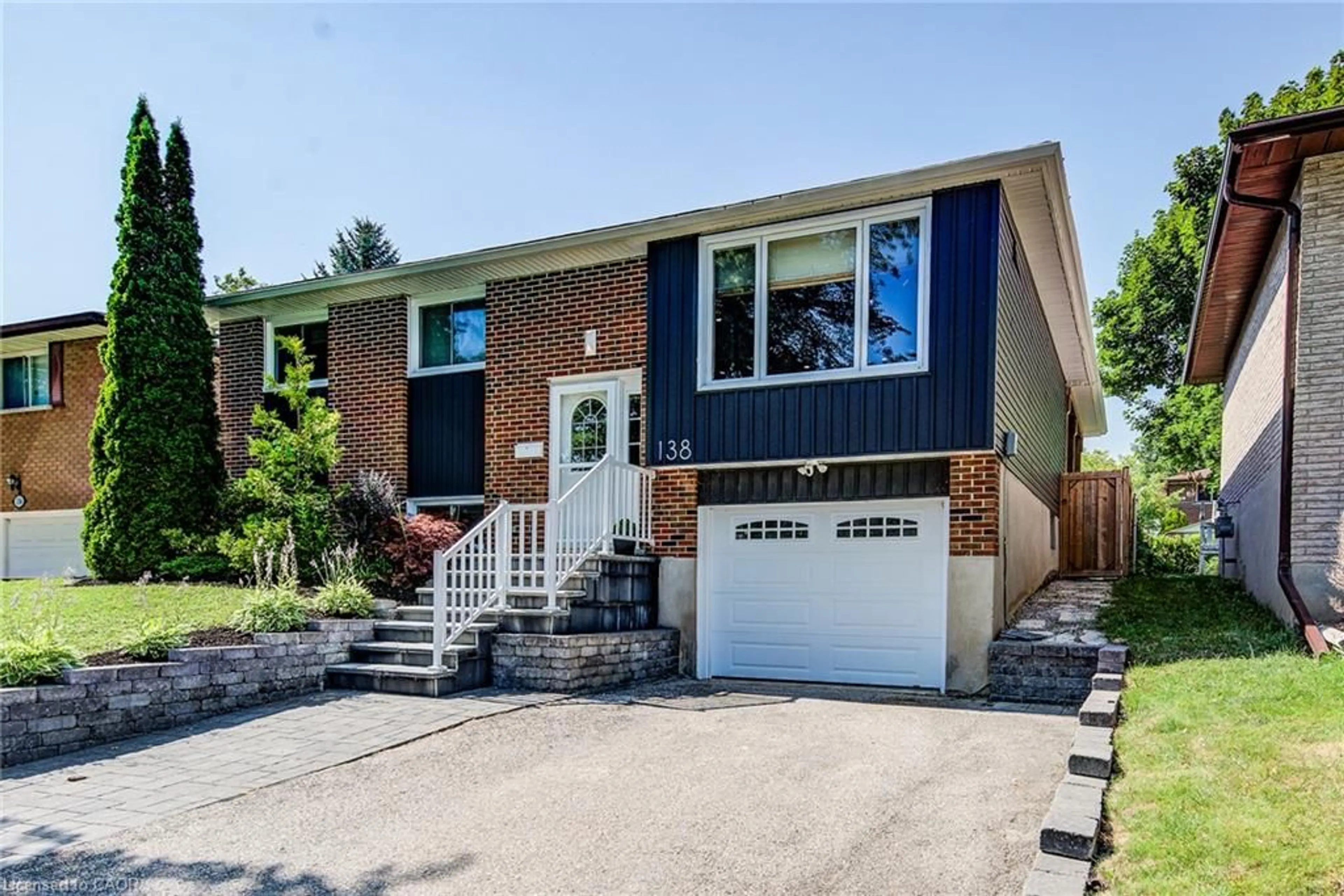 Home with brick exterior material, street for 138 Morningdale Cres, Waterloo Ontario N2V 1E6